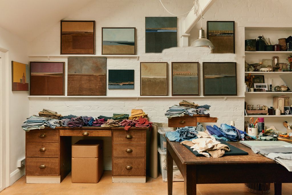 Image may contain Desk Furniture Table Box Art Painting Indoors and Cup