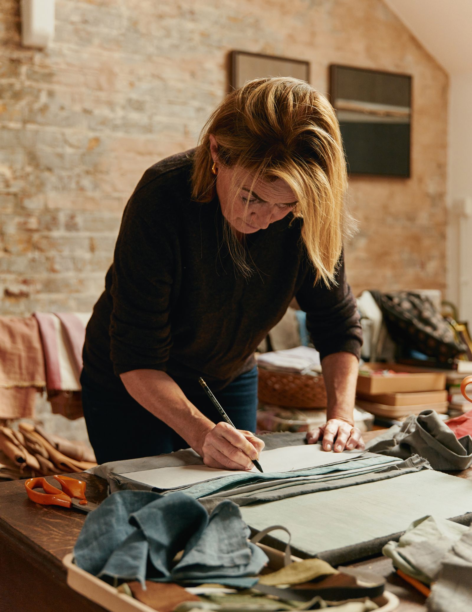 Image may contain Pen Adult Person Accessories Bag Handbag and Woodworking