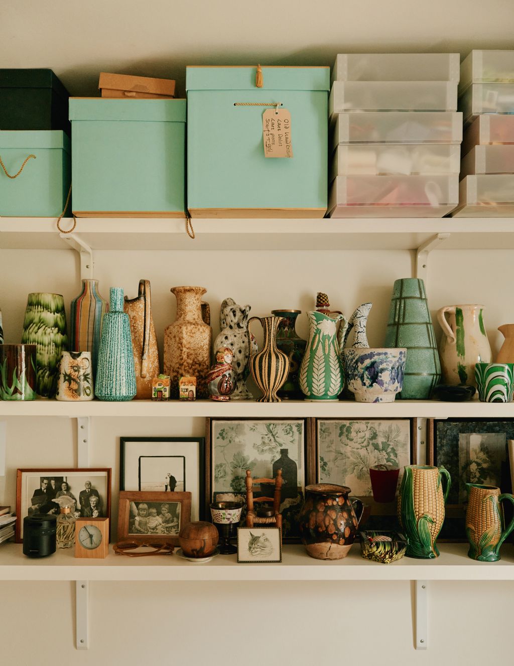 Image may contain Bill Kenney Shelf Furniture Box Cup Art Painting Person Closet Cupboard Pottery and Bookcase