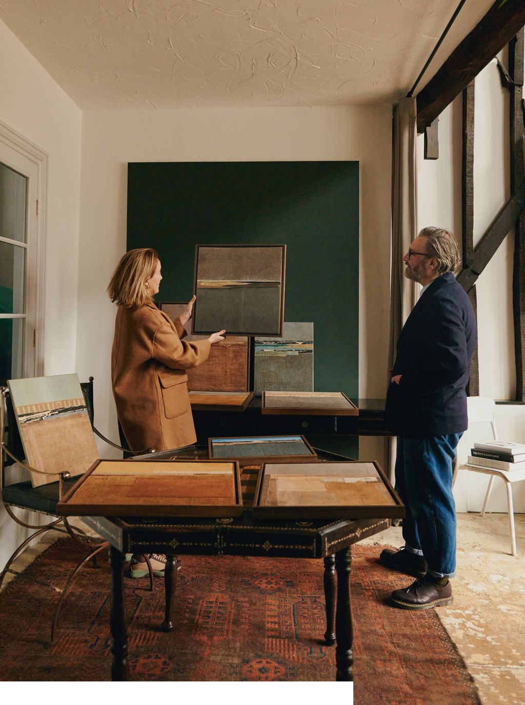 Image may contain Furniture Table Desk Clothing Footwear Shoe Adult Person Chair Accessories and Glasses