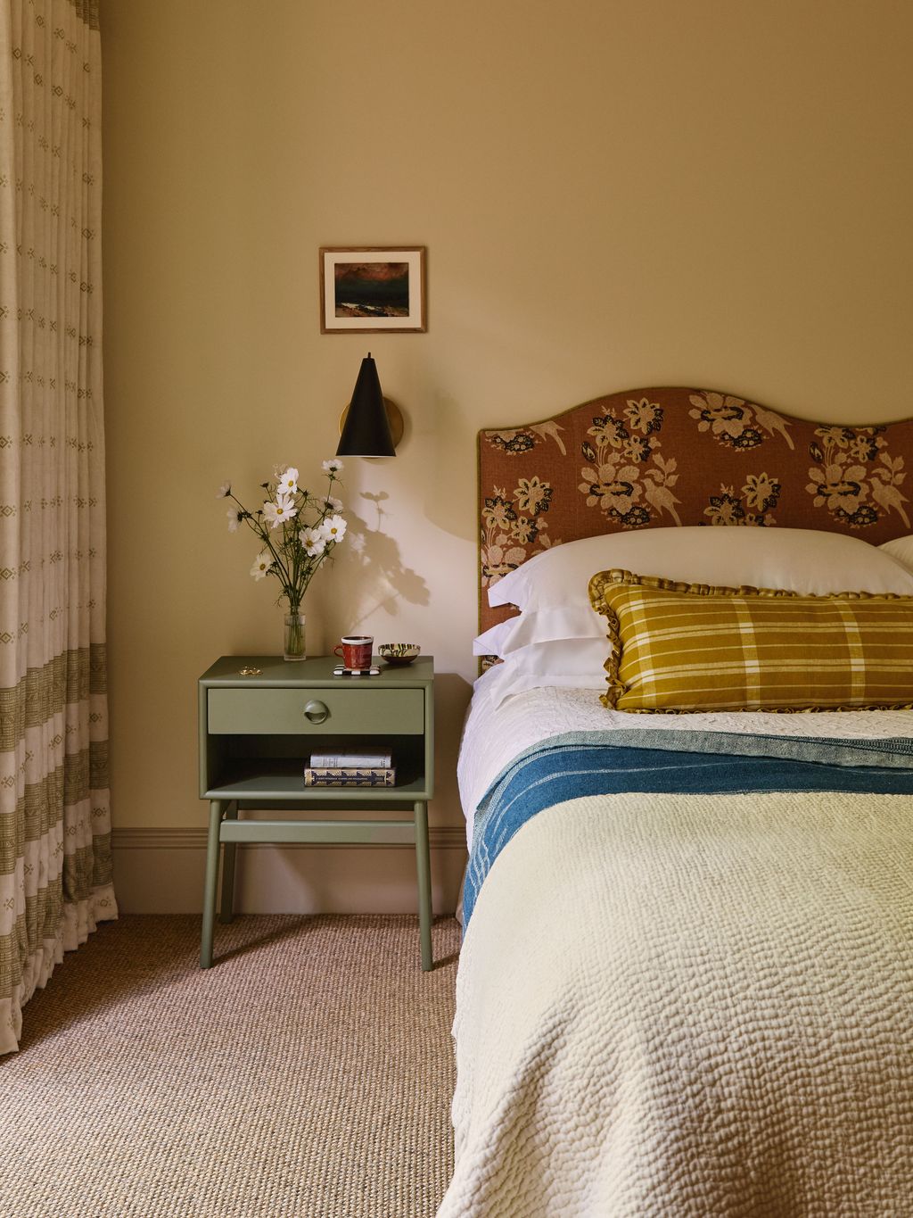 Image may contain Cushion Home Decor Bed Furniture Cup Art Painting Indoors Interior Design Pillow and Bedroom