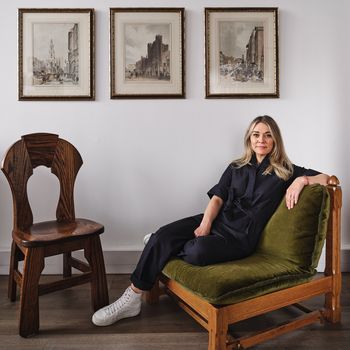 Image may contain: Furniture, Chair, Adult, Person, Art, Painting, Sitting, Clothing, Footwear, Shoe, and Chaise