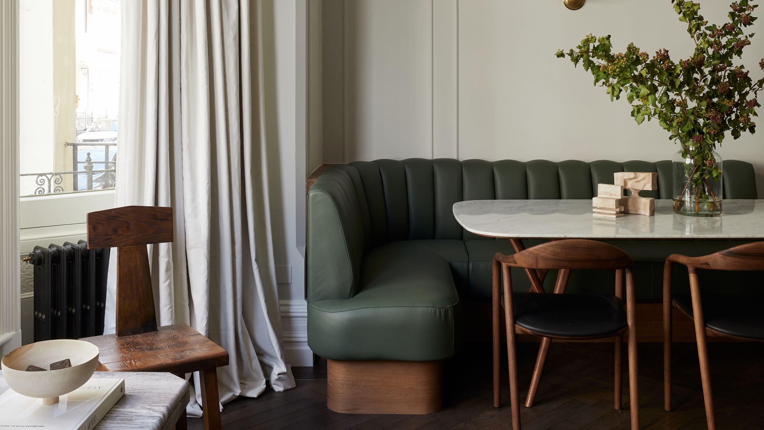 Image may contain: Architecture, Building, Dining Room, Dining Table, Furniture, Indoors, Room, Table, Living Room, and Chair