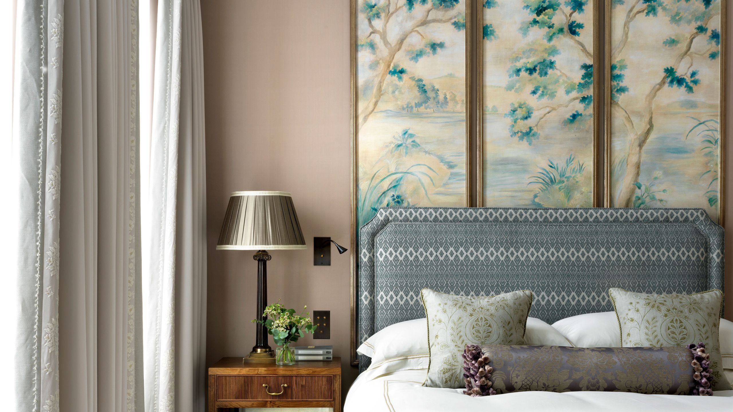 Image may contain: Cushion, Home Decor, Lamp, Pillow, Indoors, Interior Design, Bed, Furniture, Plant, and Table Lamp