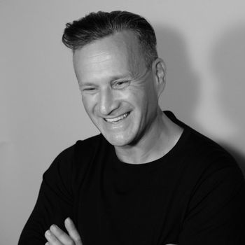 Image may contain: Sammy Kaye, Face, Head, Person, Photography, Portrait, Happy, Smile, Adult, Dimples, and Laughing