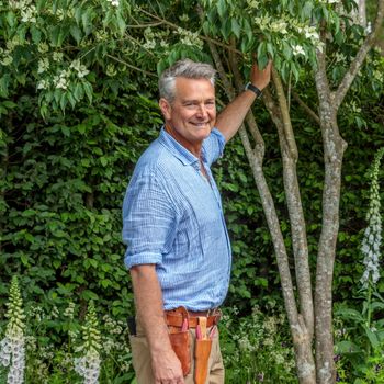 Image may contain: Face, Head, Person, Photography, Portrait, Herbal, Herbs, Plant, Vegetation, Tree, Jungle, and Nature