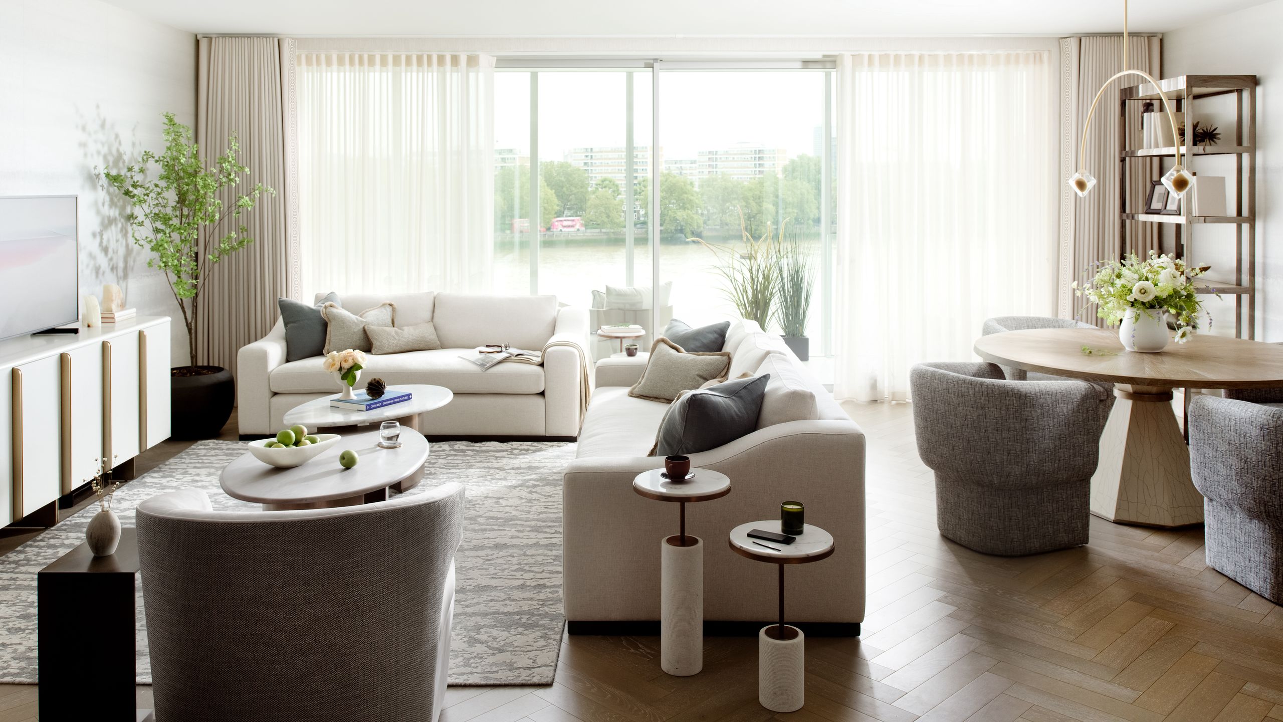 Image may contain: Architecture, Building, Furniture, Indoors, Living Room, Room, Coffee Table, Table, Home Decor, and Couch