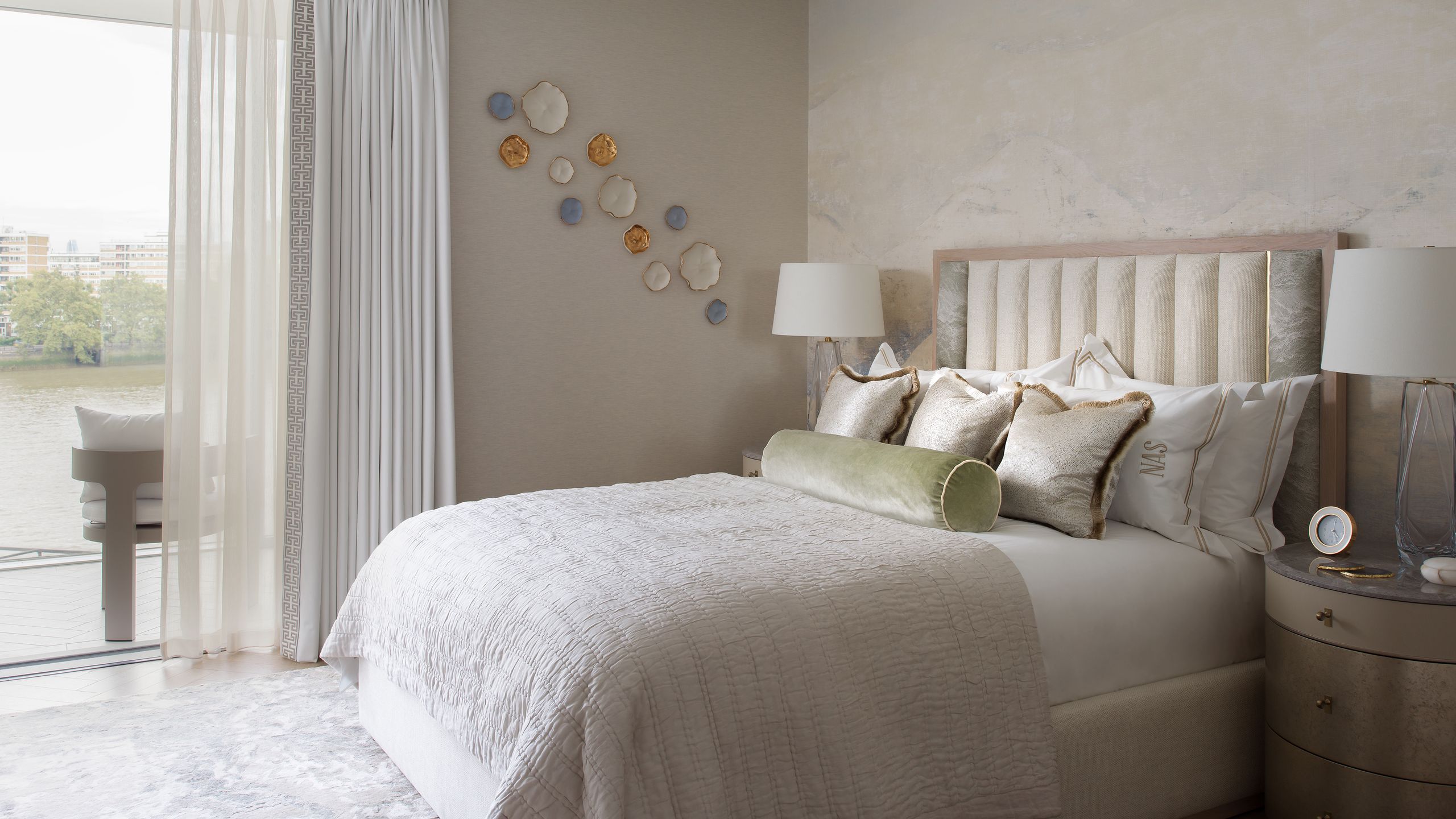 Image may contain: Lamp, Home Decor, Cushion, Bed, Furniture, Indoors, Interior Design, Bedroom, Room, and Pillow