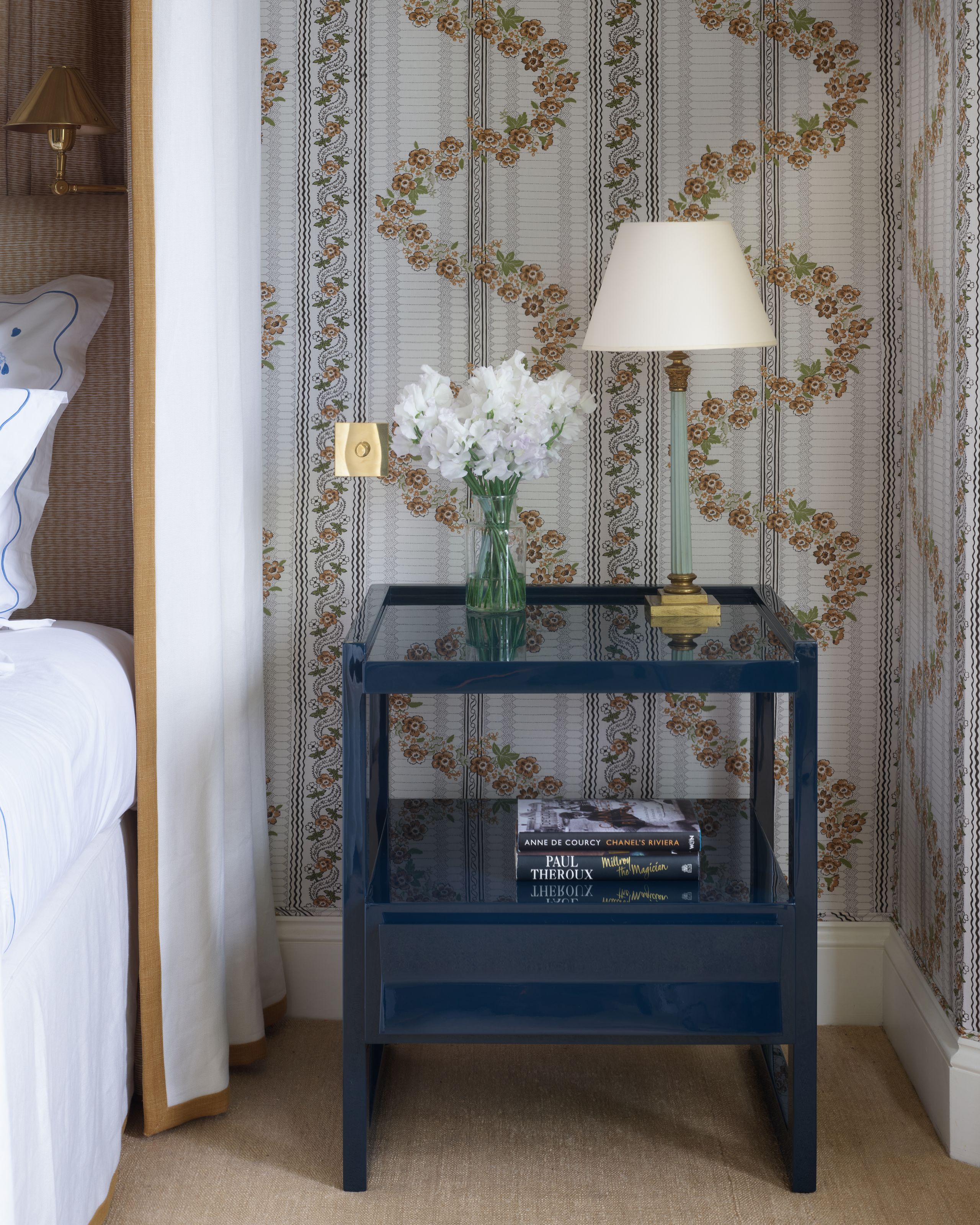 Image may contain: Lamp, Bed, Furniture, Table Lamp, and Table