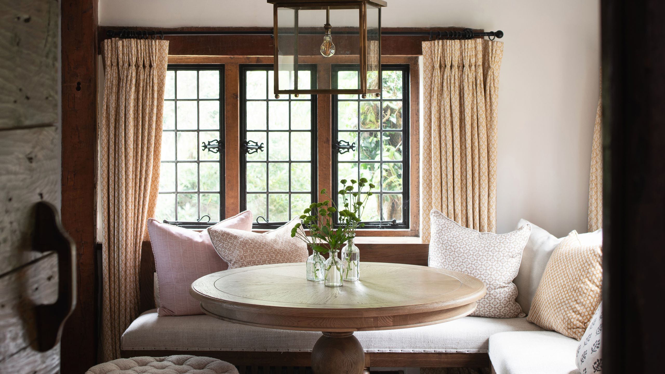 Image may contain: Furniture, Lamp, Plant, Table, and Home Decor