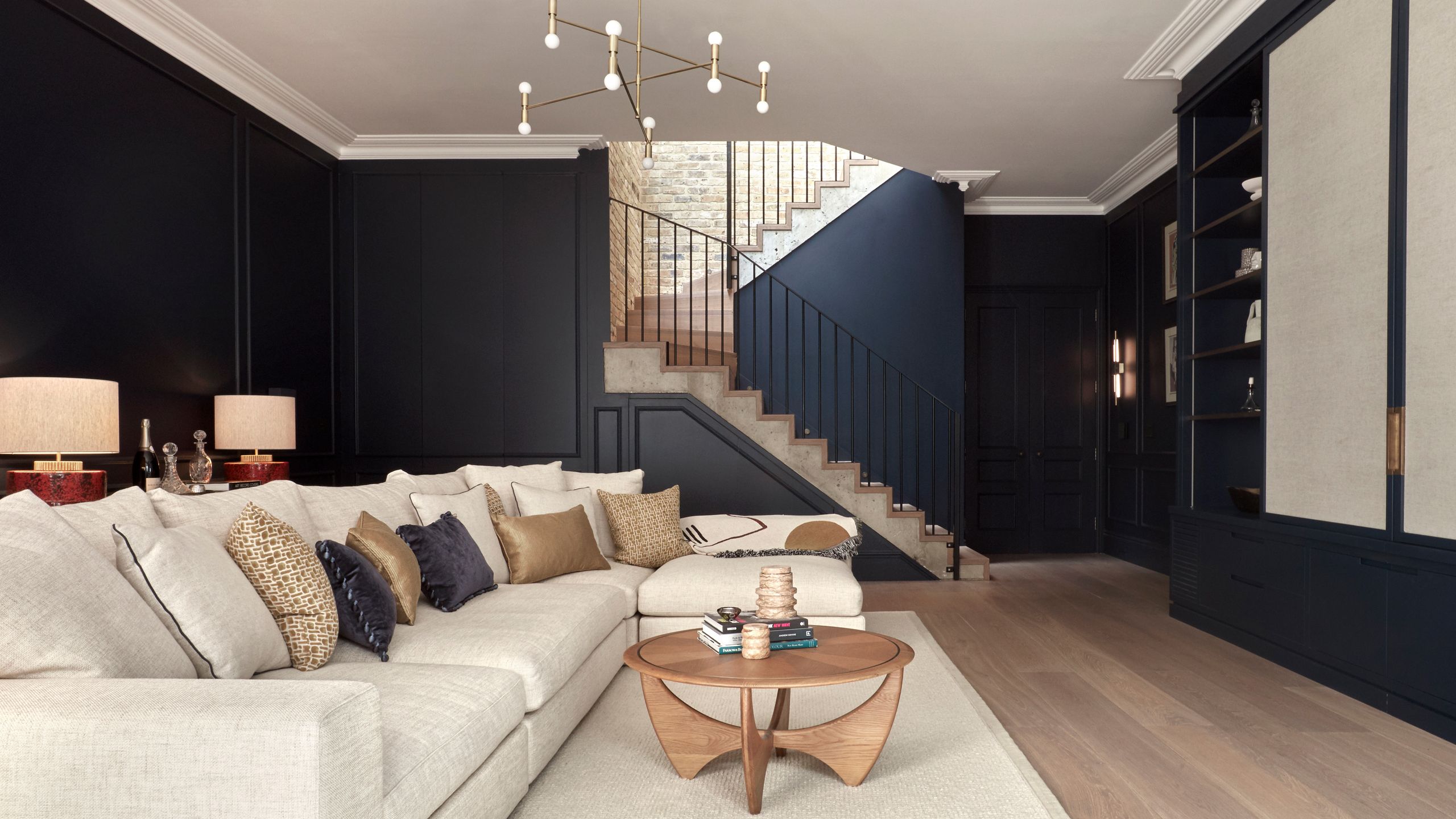 Image may contain: Architecture, Building, Furniture, Indoors, Living Room, Room, Home Decor, Interior Design, and Table