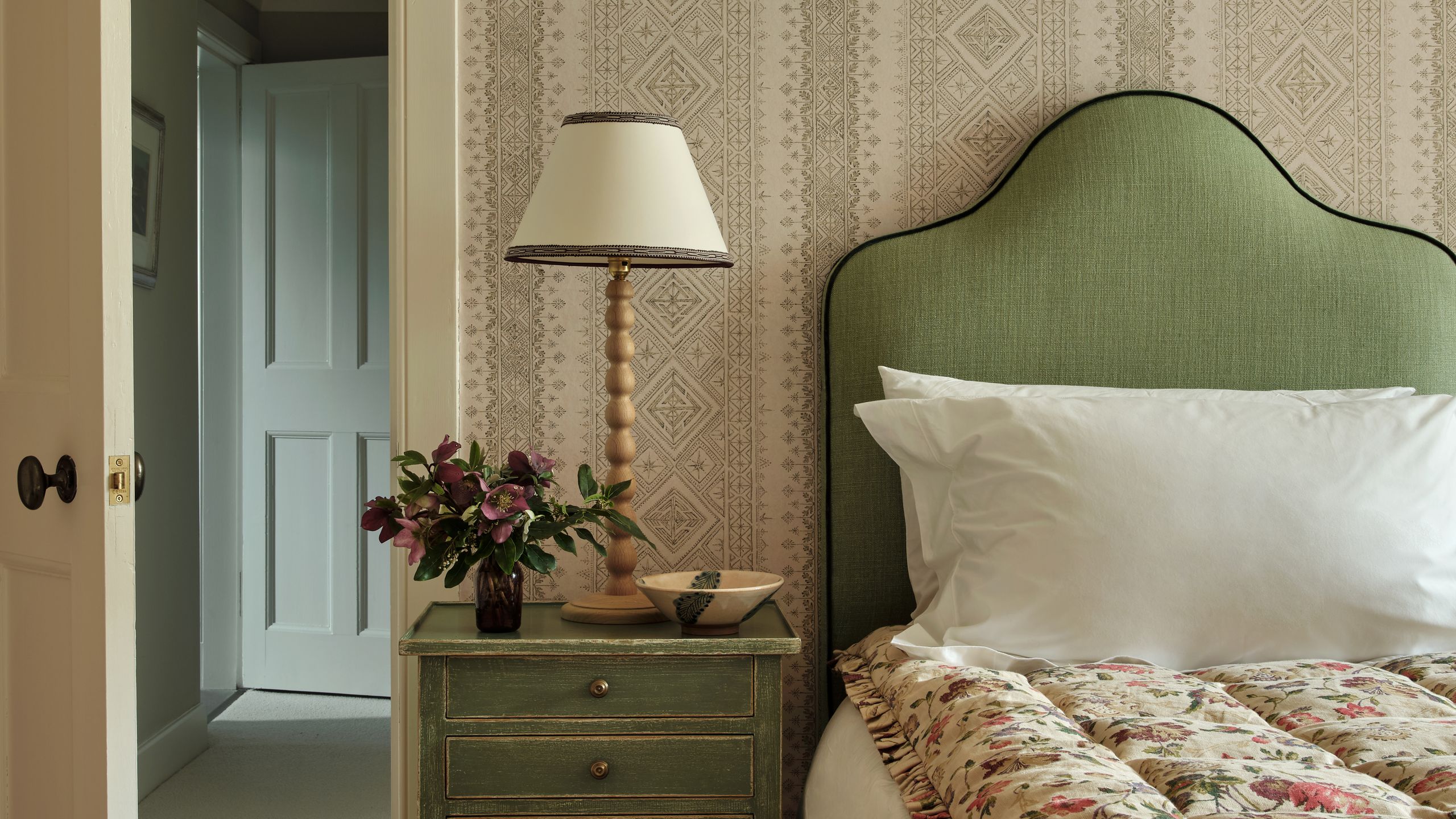 Image may contain: Lamp, Cushion, Home Decor, Table Lamp, Bed, Furniture, Pillow, Art, Painting, Indoors, and Interior Design