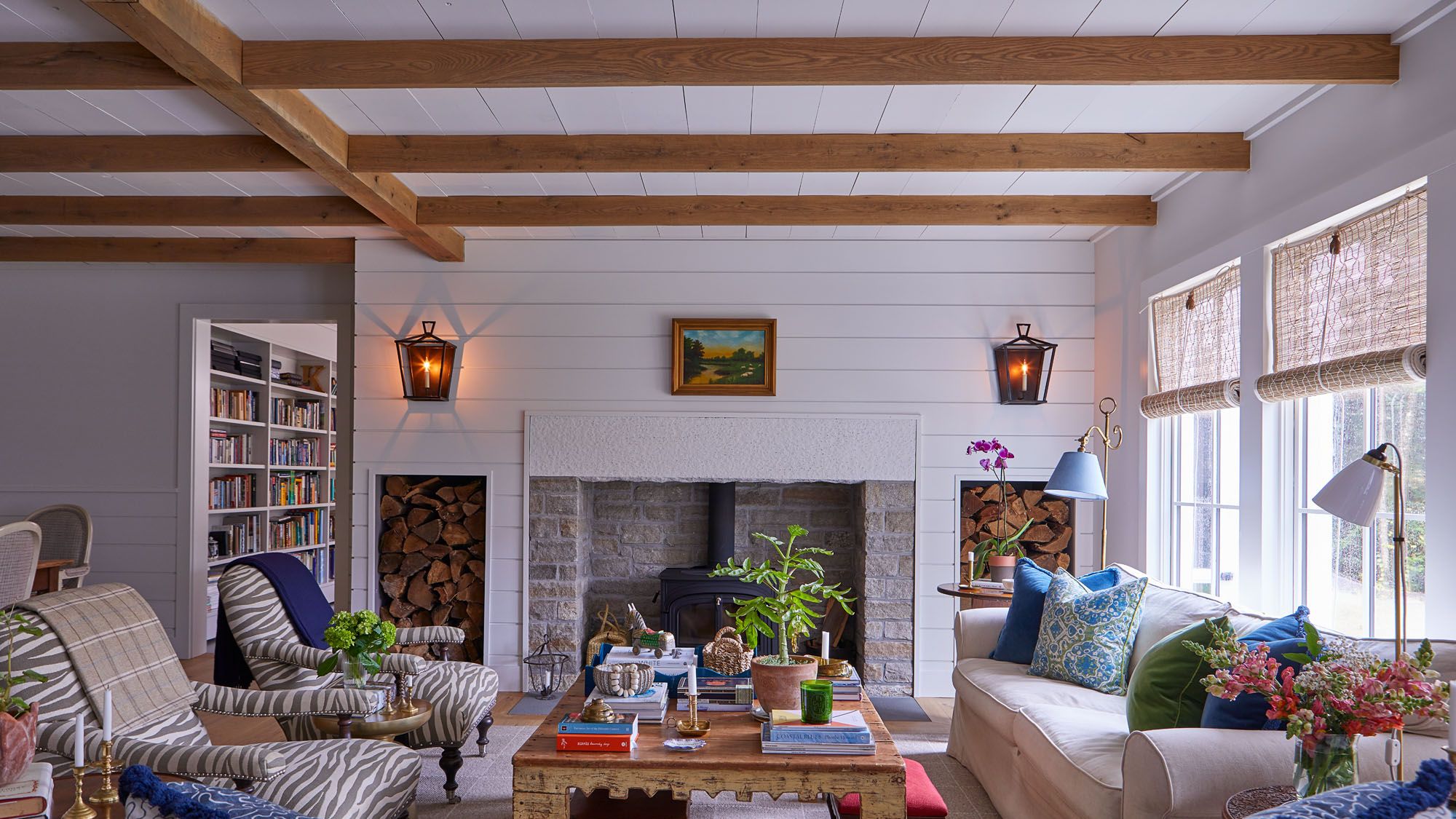 Image may contain: Home Decor, Plant, Lamp, Architecture, Building, Furniture, Indoors, Living Room, Room, Art, and Painting