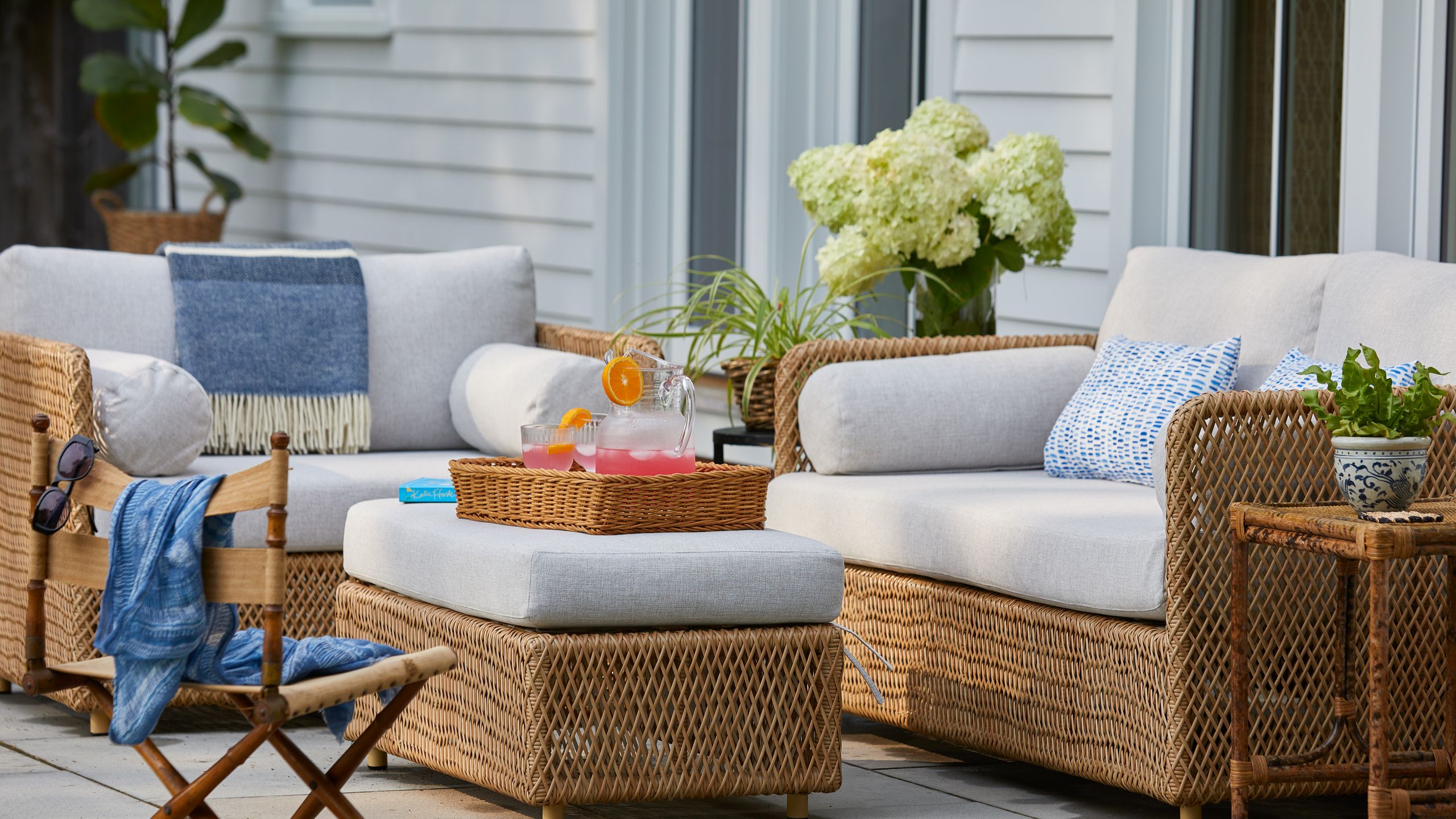 Image may contain: Chair, Furniture, Plant, Couch, Cushion, Home Decor, Coffee Table, Table, Accessories, and Glasses