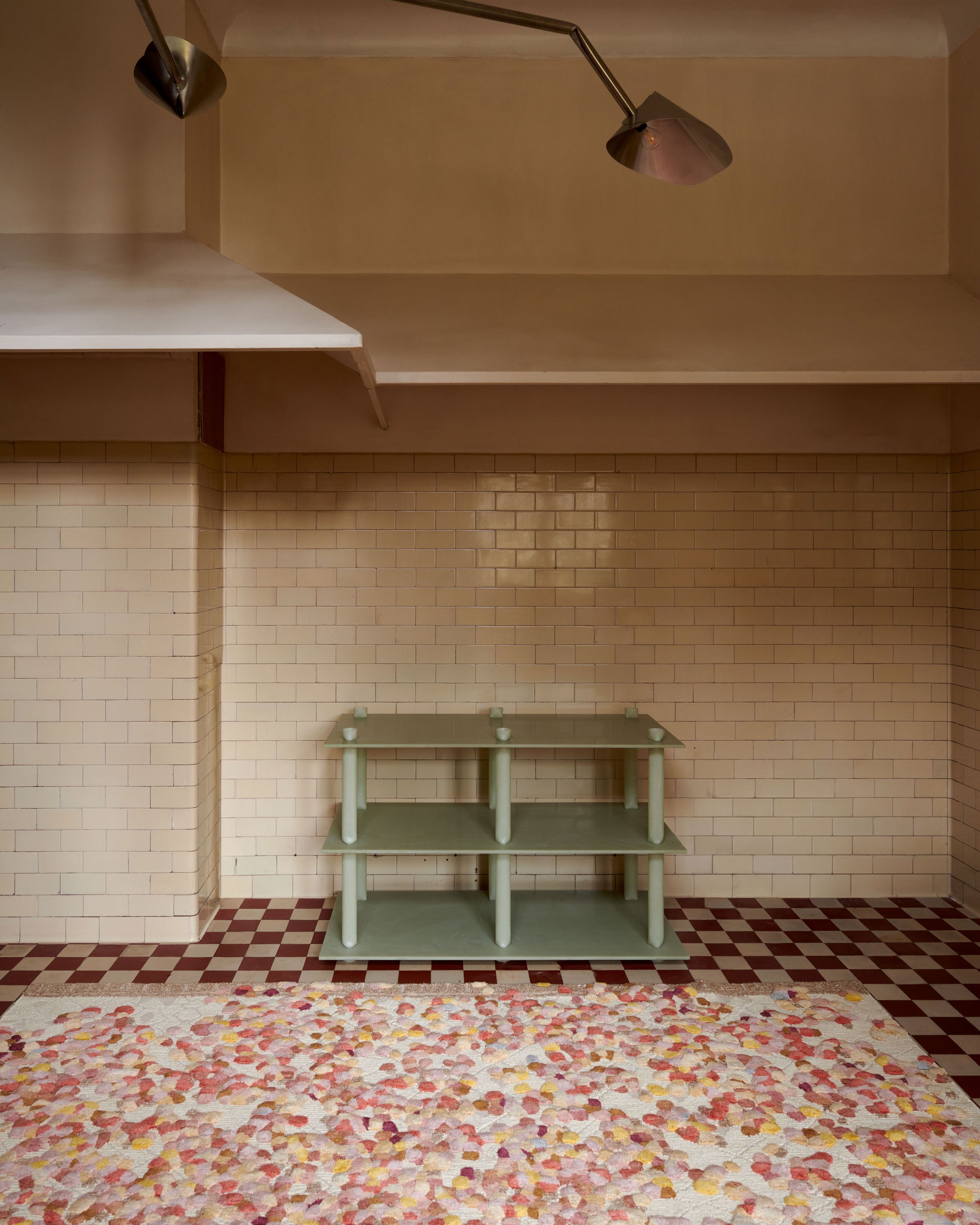 Image may contain: Home Decor, Floor, Rug, Corner, Indoors, Interior Design, Flooring, Bench, Furniture, and Table