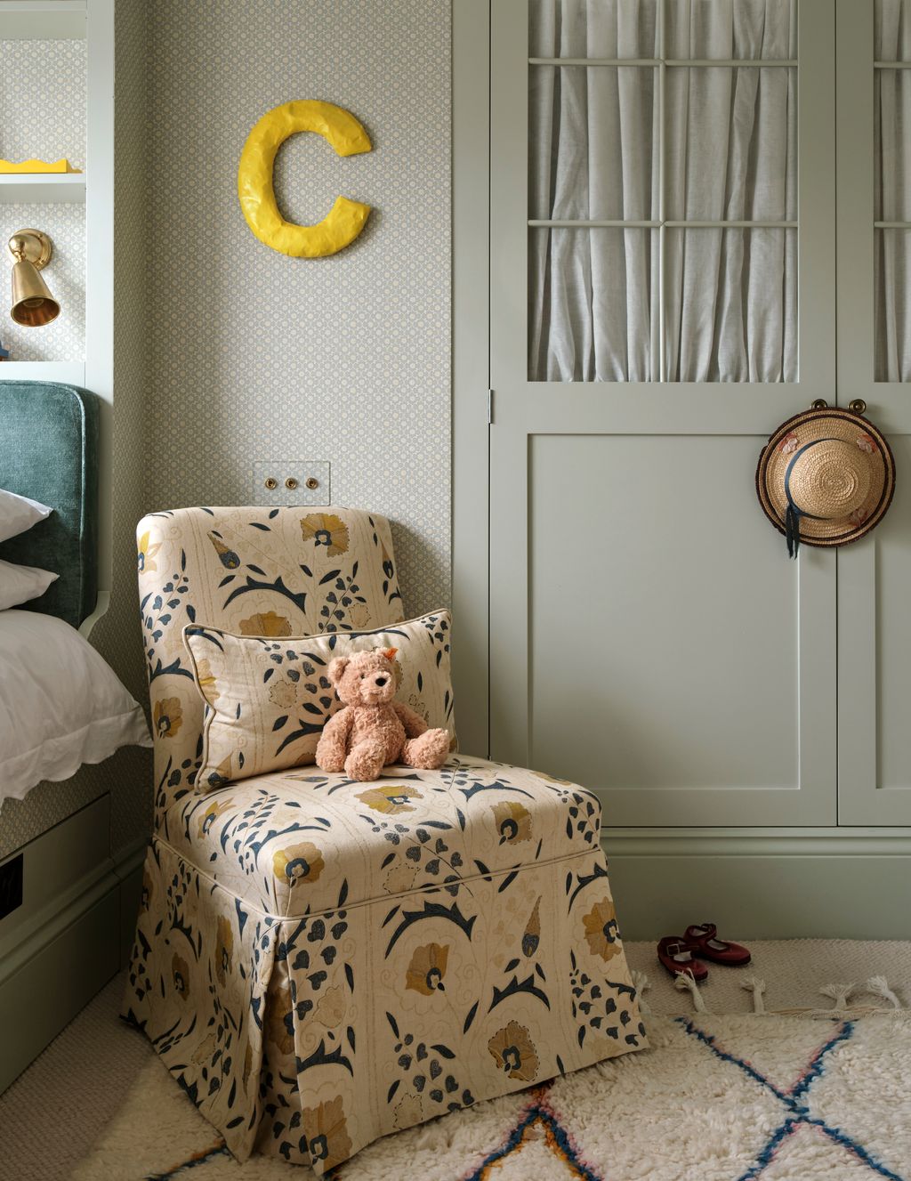 Image may contain Furniture Toy Chair Clothing Footwear Shoe Home Decor Rug and Hat