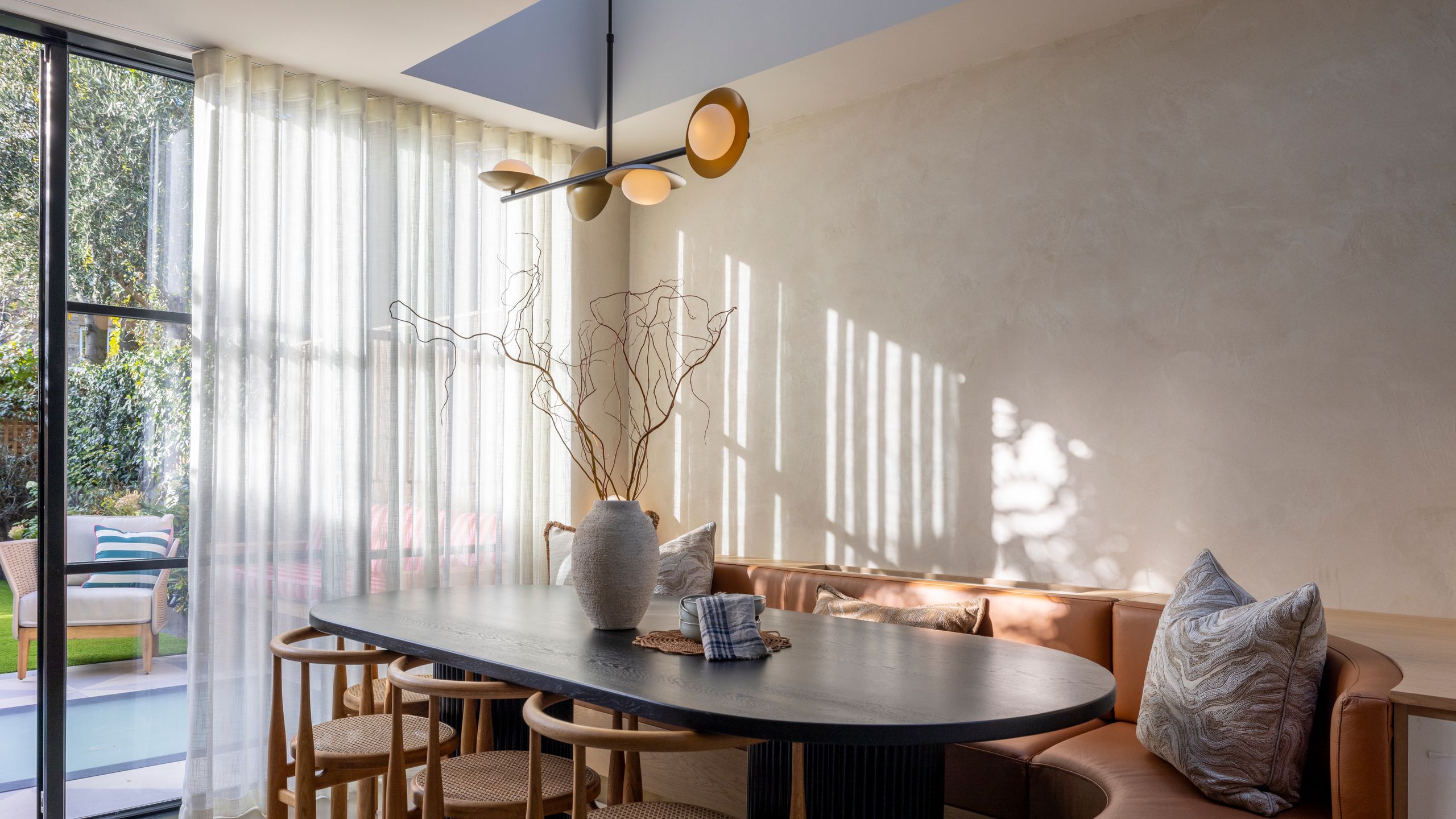 Image may contain: Architecture, Building, Dining Room, Dining Table, Furniture, Indoors, Room, Table, and Interior Design