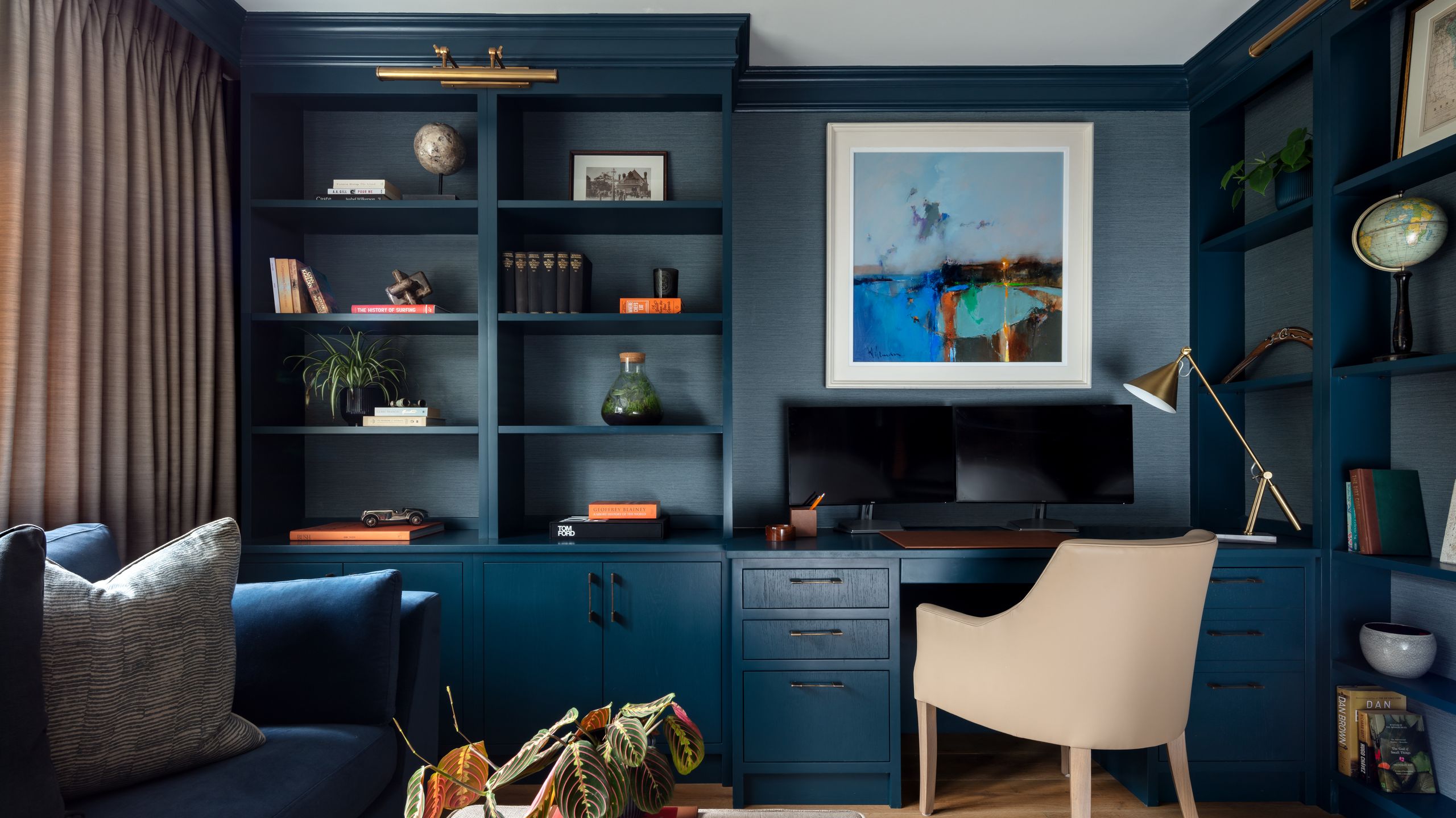 Image may contain: Book, Publication, Architecture, Building, Furniture, Indoors, Living Room, Room, Home Decor, and Lamp