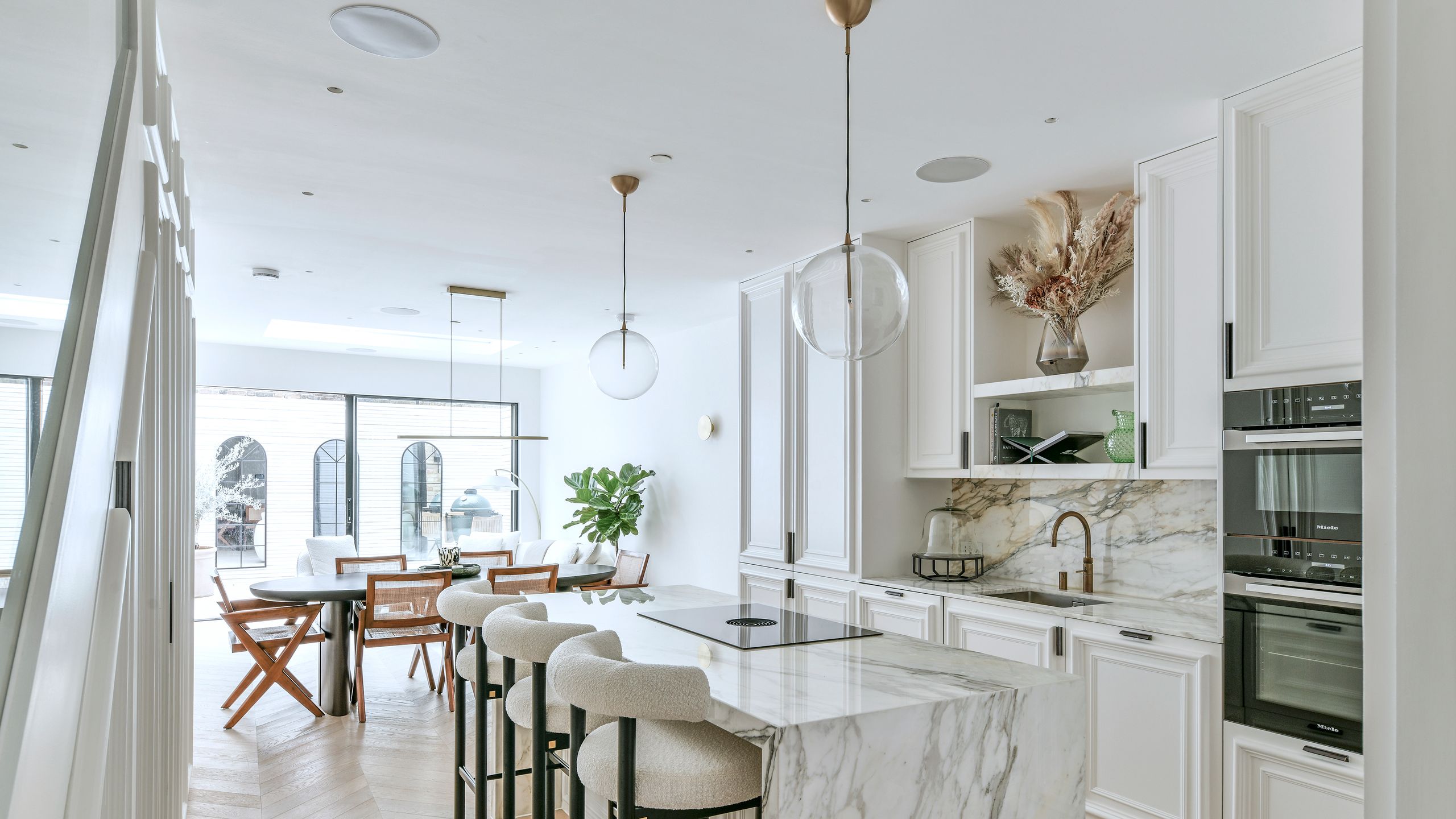 Image may contain: Architecture, Building, Dining Room, Dining Table, Furniture, Indoors, Room, Table, and Interior Design