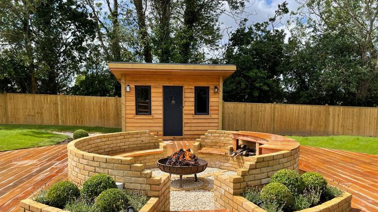 Image may contain: Indoors, Interior Design, Backyard, Nature, Outdoors, Yard, Wood, Hardwood, Stained Wood, and Architecture