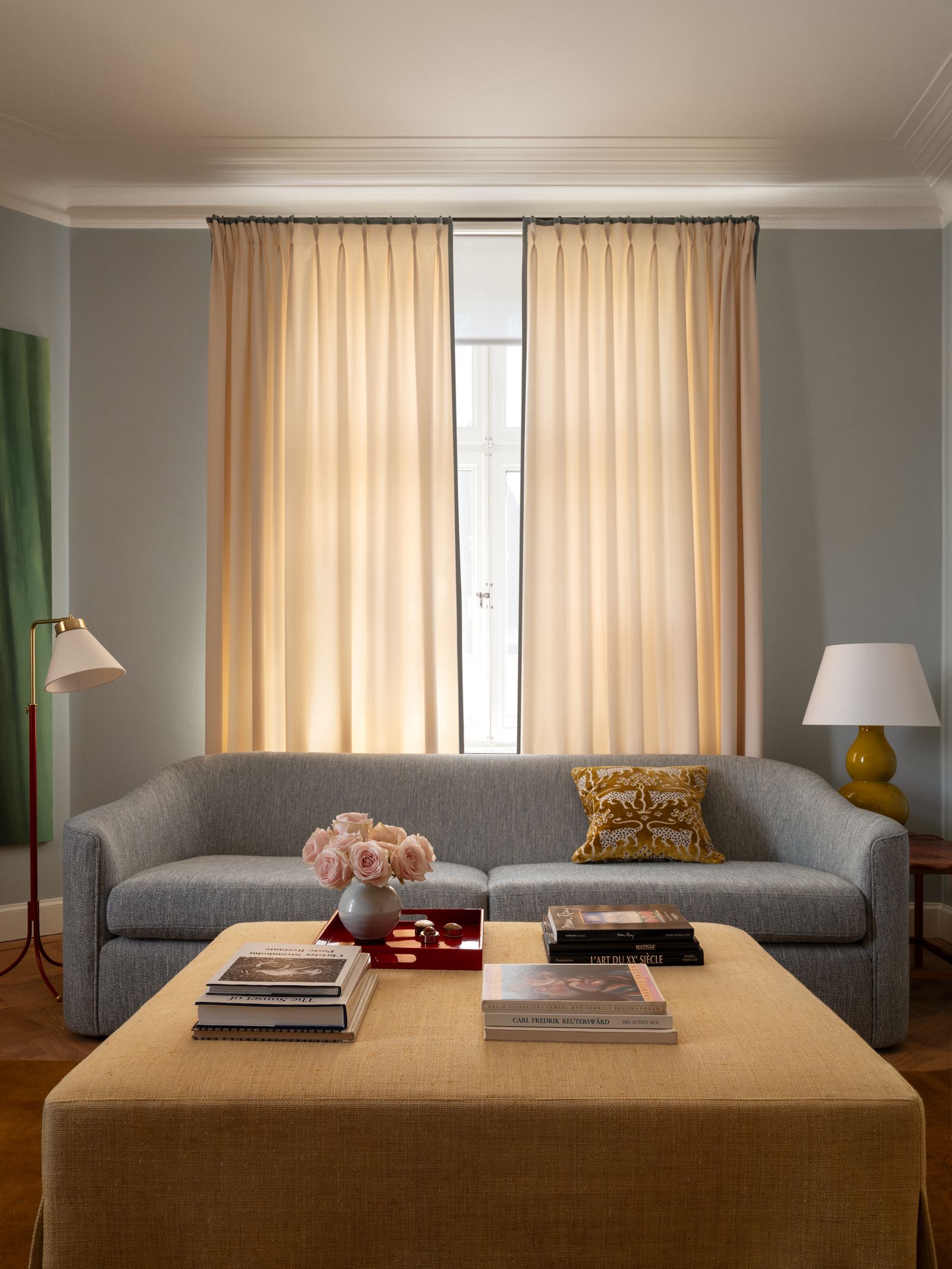 Image may contain Lamp Couch Furniture Architecture Building Indoors Living Room Room Table and Coffee Table