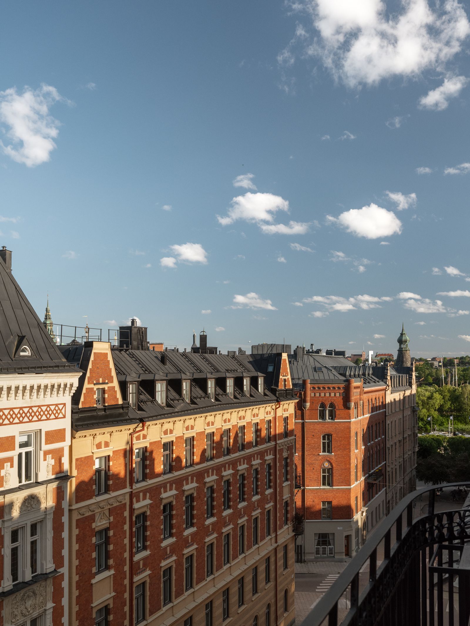 Image may contain City Urban Architecture Building Cityscape Nature Outdoors Sky Condo Housing and Neighborhood