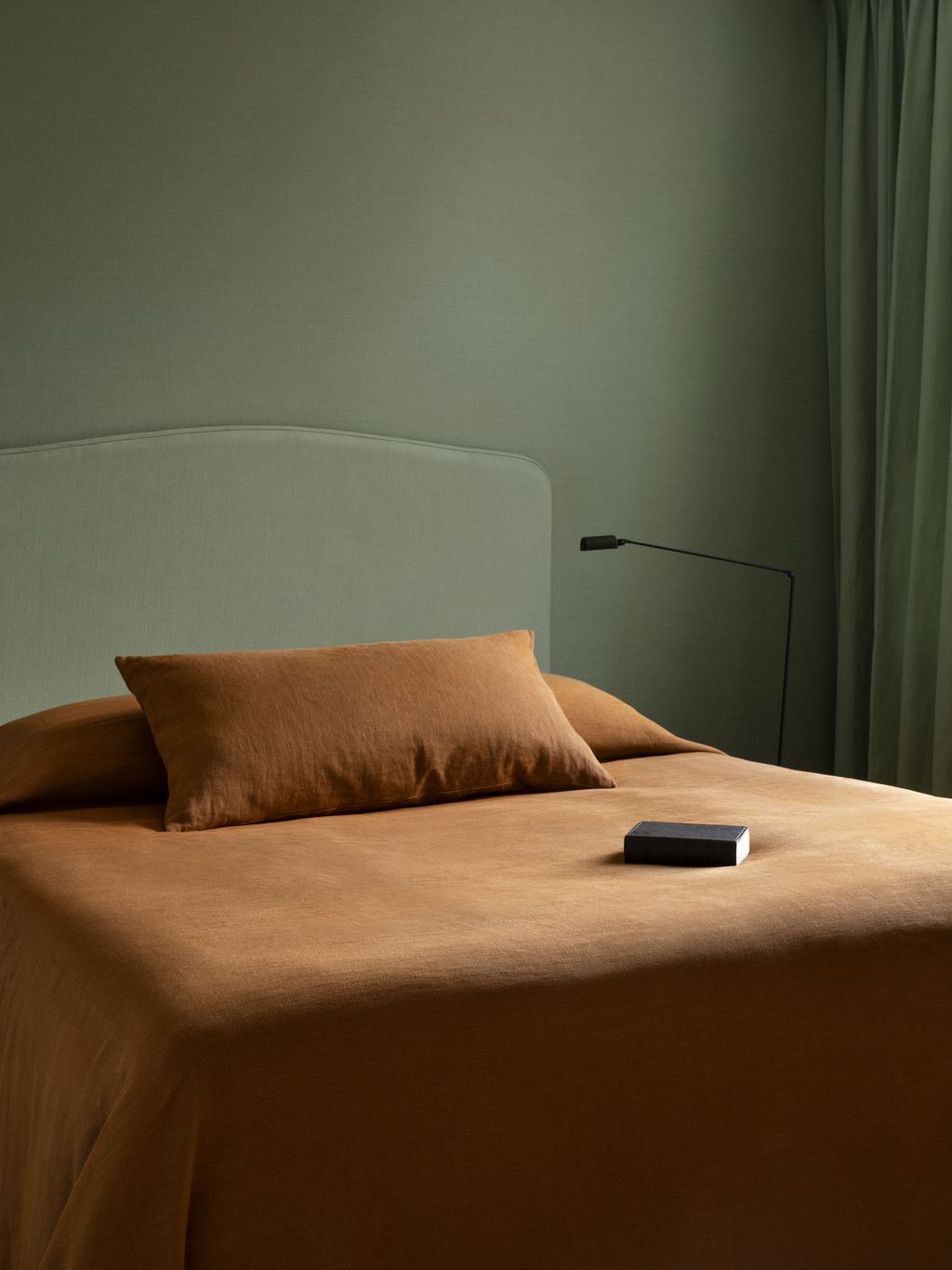 Image may contain Cushion Home Decor Bed Furniture Pillow Lamp Indoors Interior Design and Bed Sheet