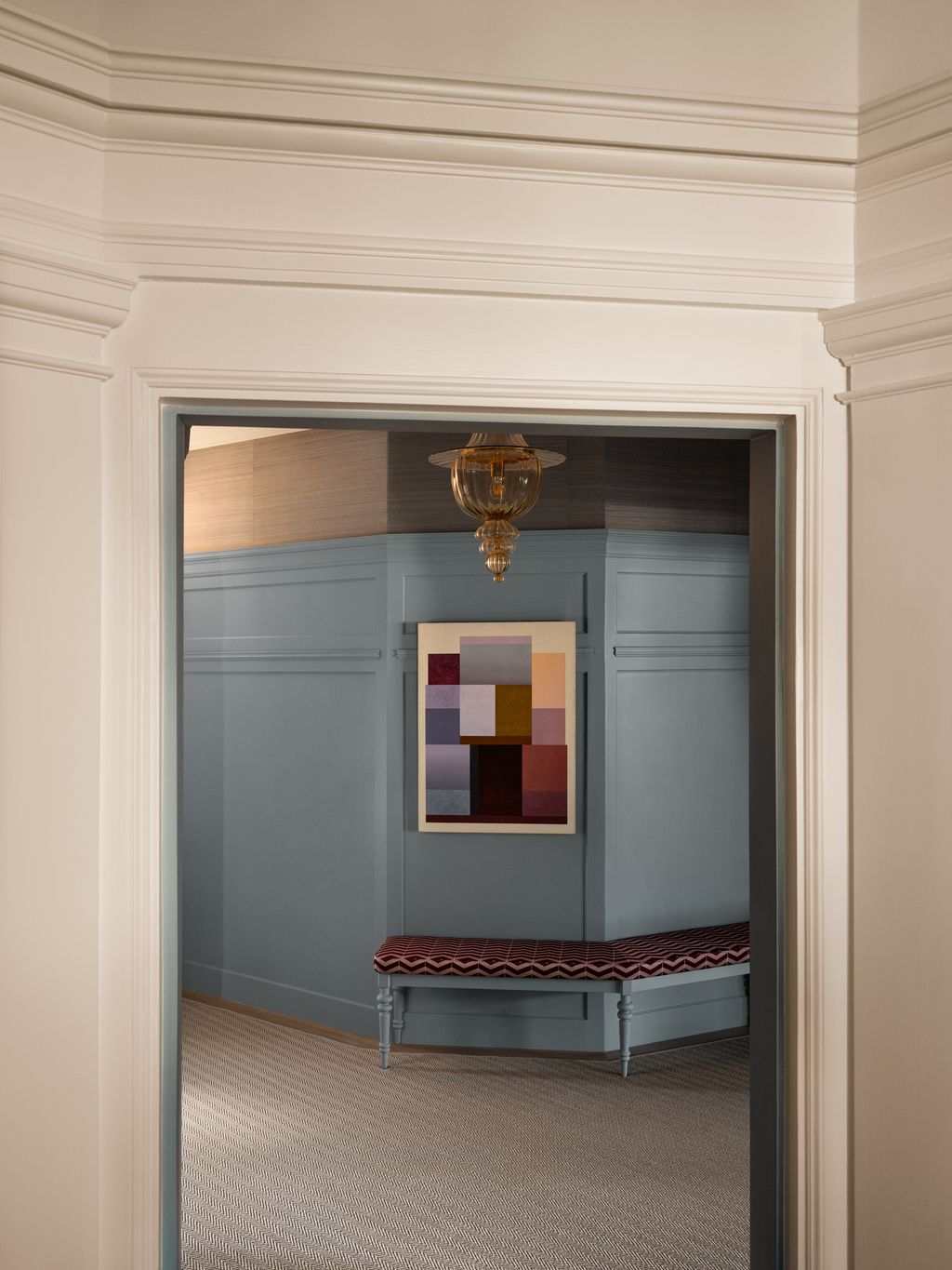 Image may contain Indoors Interior Design Lamp Corner Bench Furniture Chandelier Dressing Room and Room