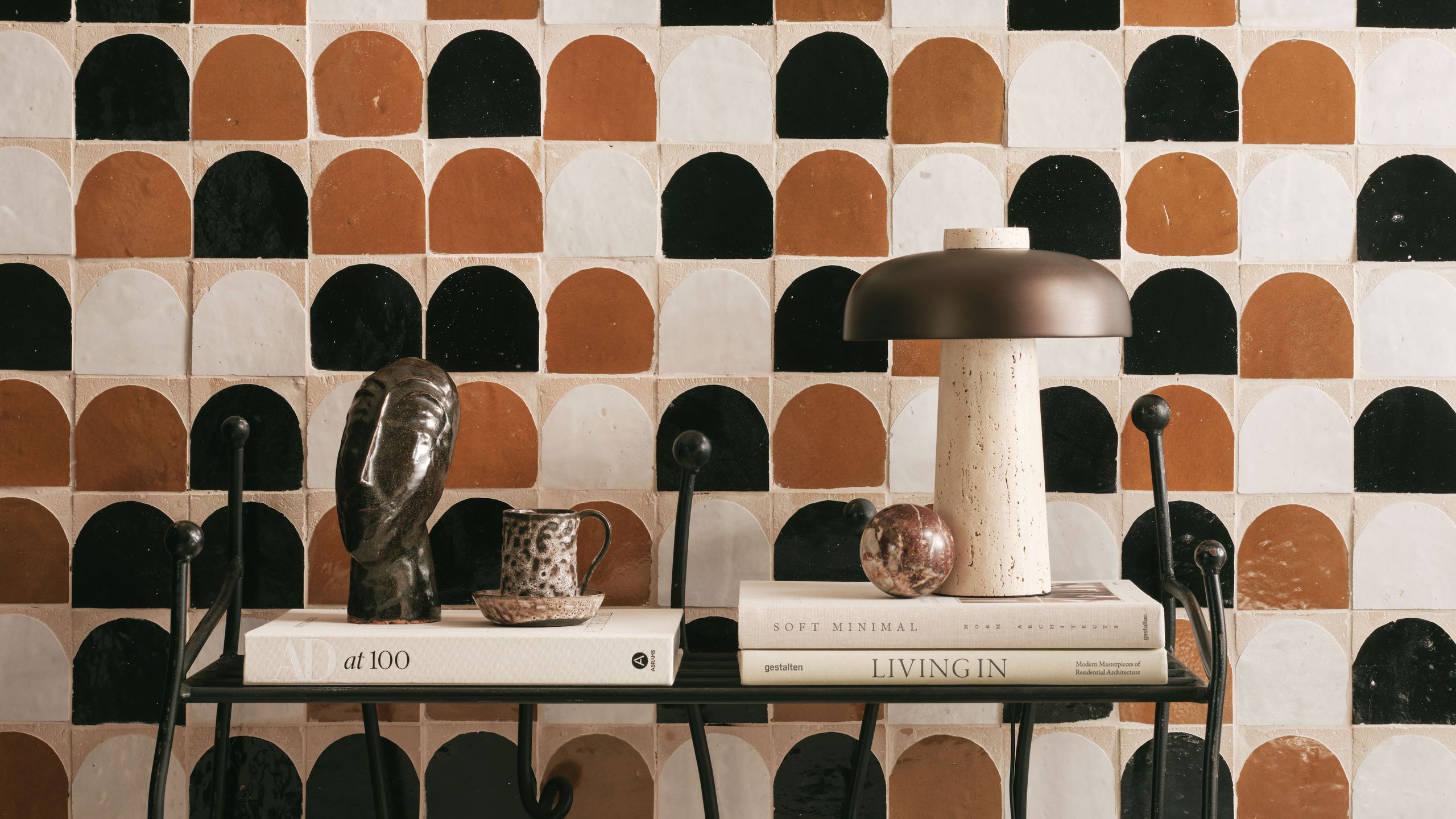 Image may contain: Indoors, Interior Design, Person, Architecture, Building, Wall, Mace Club, and Weapon