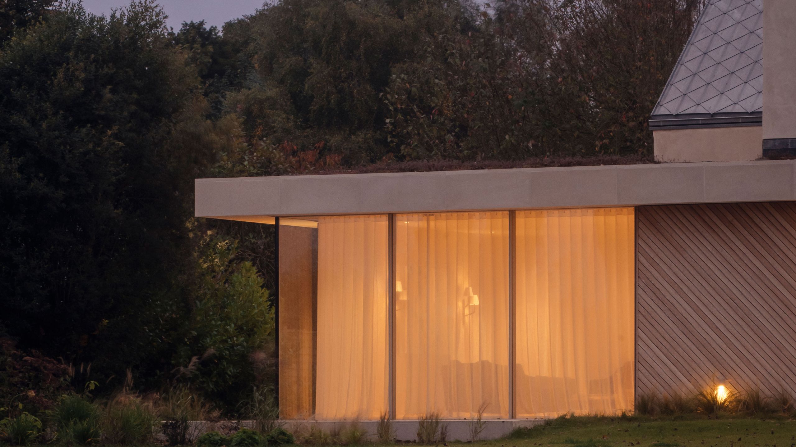 Image may contain: Indoors, Interior Design, Garage, Backyard, Nature, Outdoors, and Yard