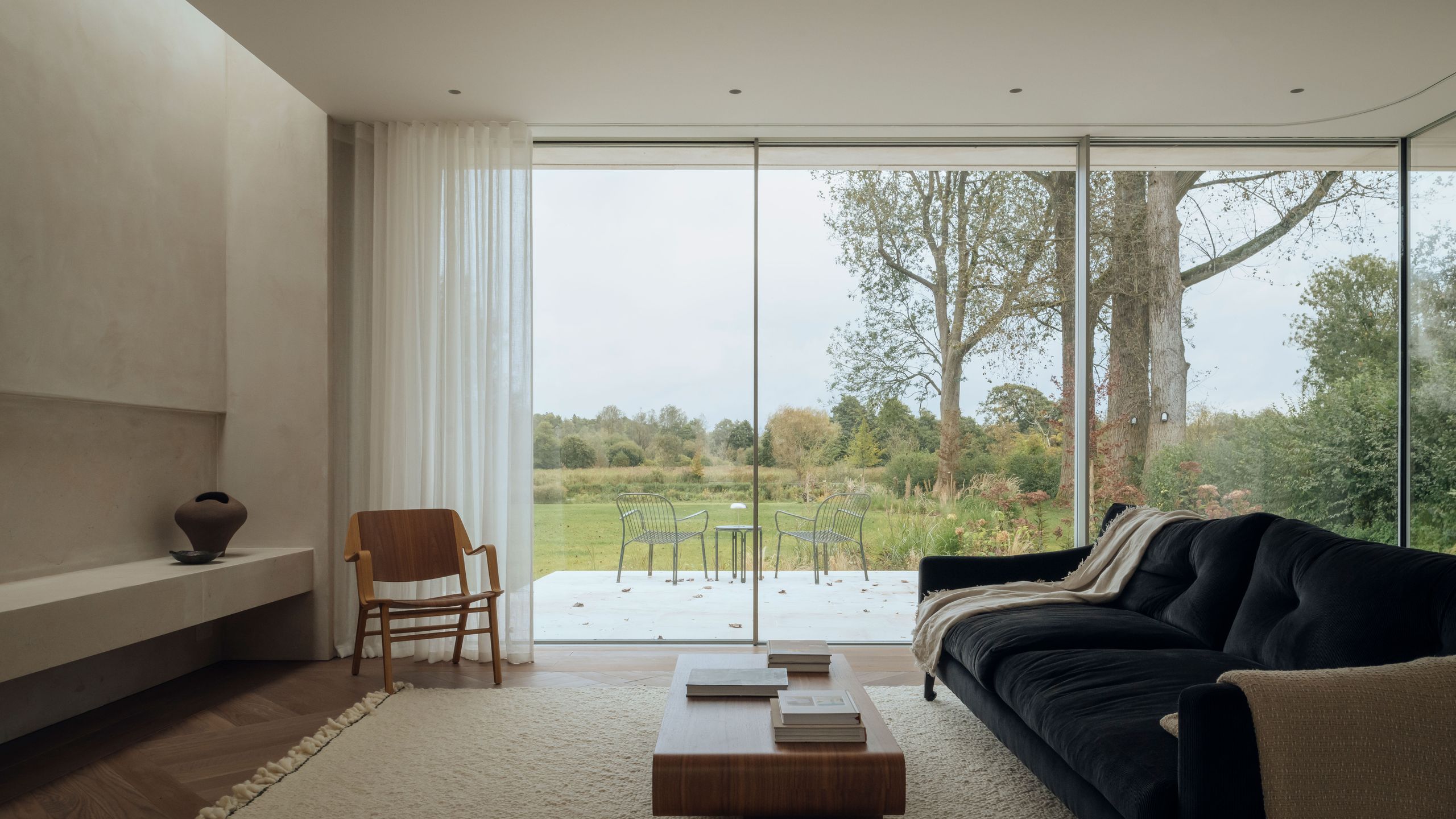 Image may contain: Coffee Table, Furniture, Table, Indoors, Interior Design, Architecture, Building, Living Room, and Room