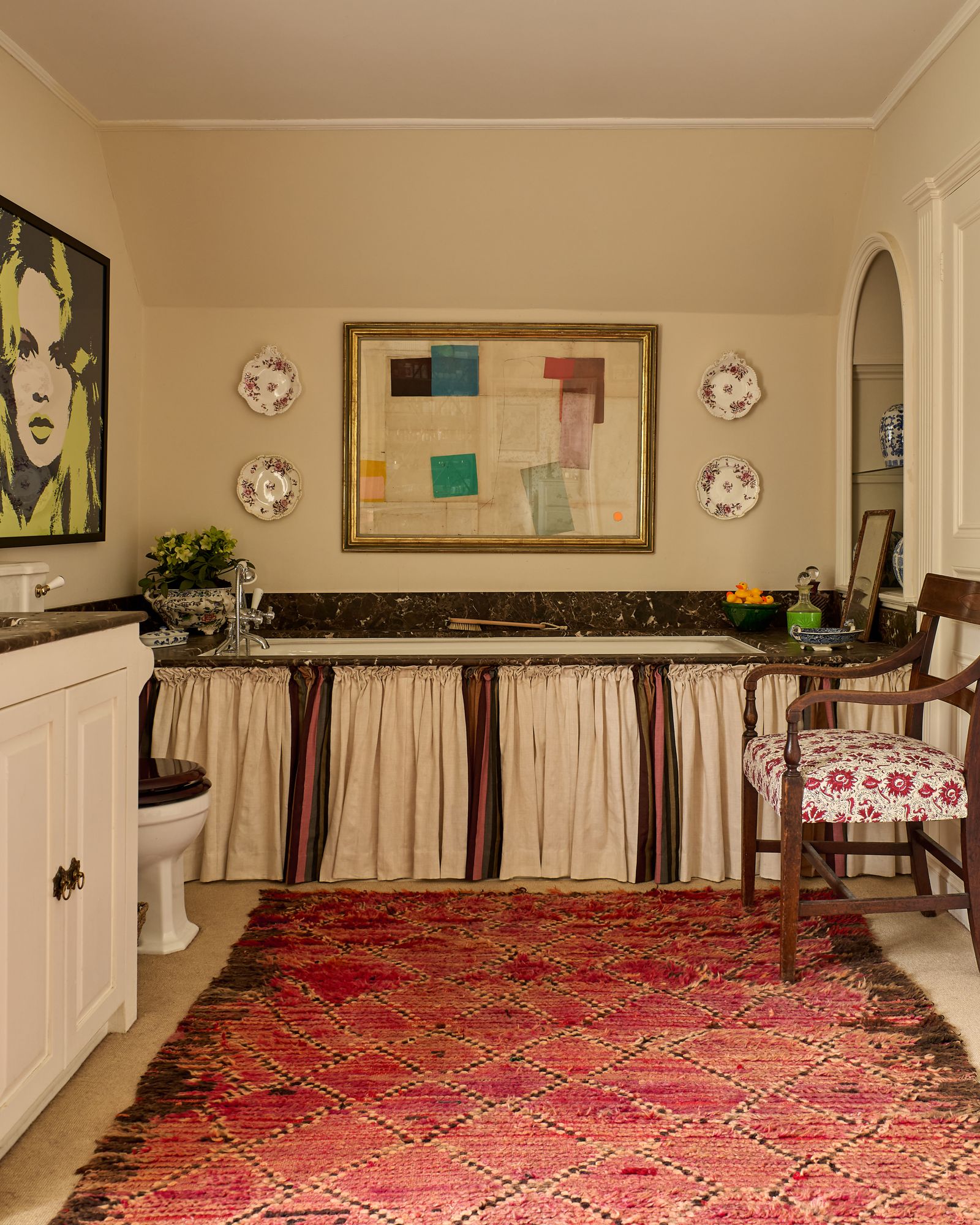 Image may contain Home Decor Rug Chair Furniture Art Painting Indoors Interior Design Plate Bathroom and Room