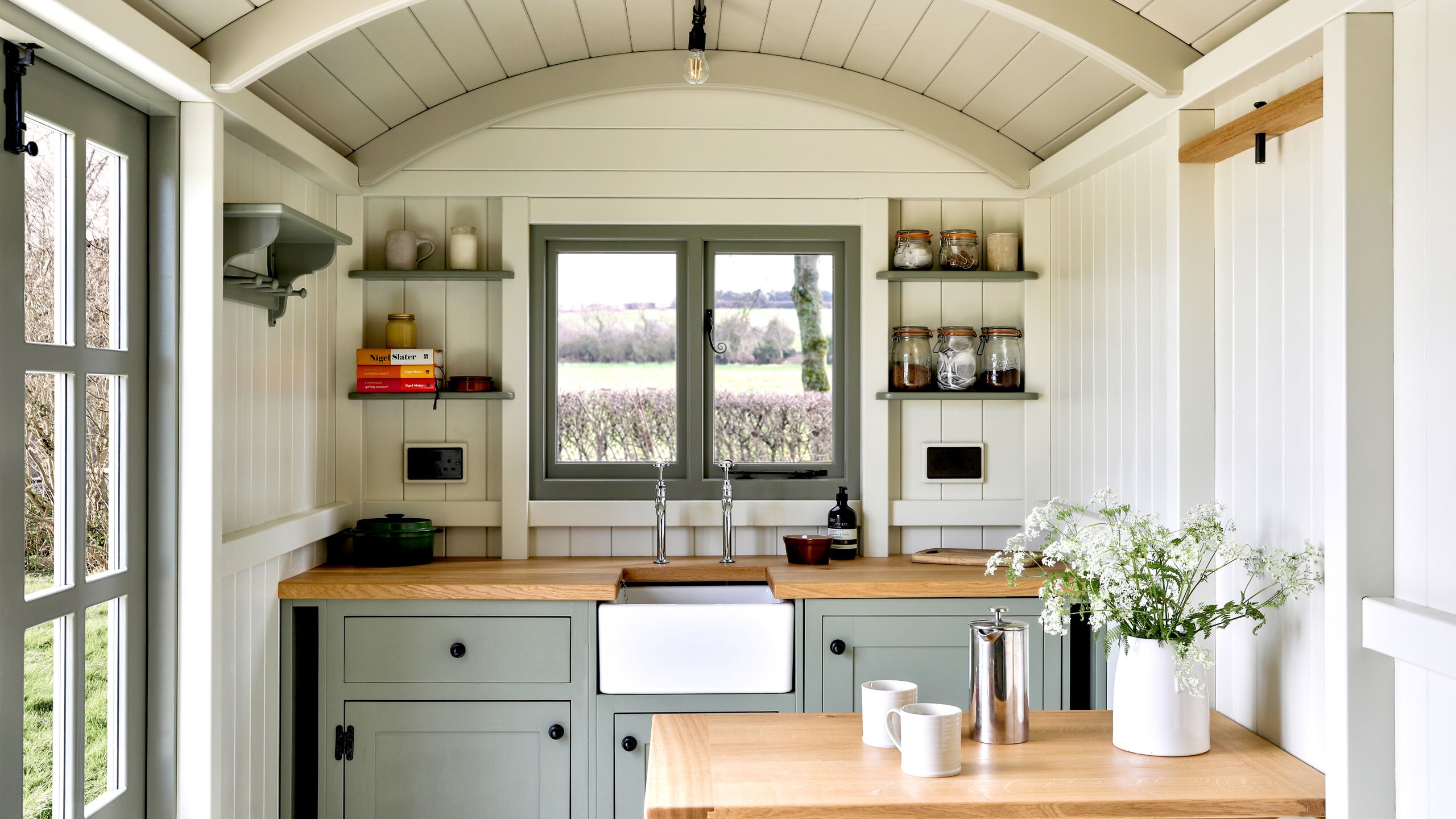 Image may contain: Indoors, Interior Design, Kitchen, and Cup