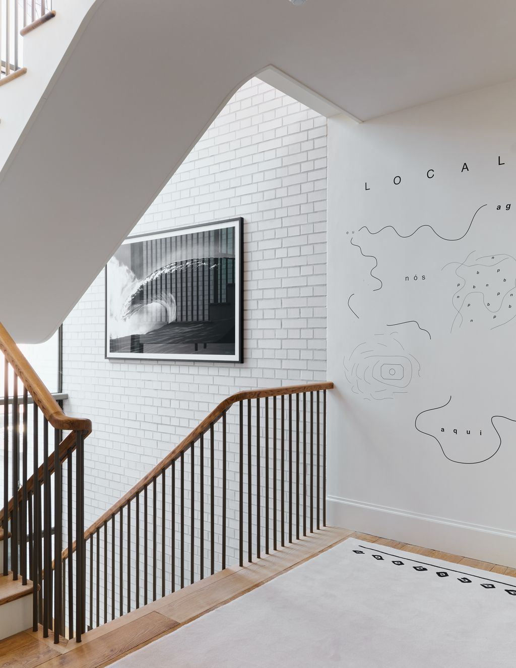 Image may contain Indoors Interior Design Architecture Building Foyer House Housing and Staircase