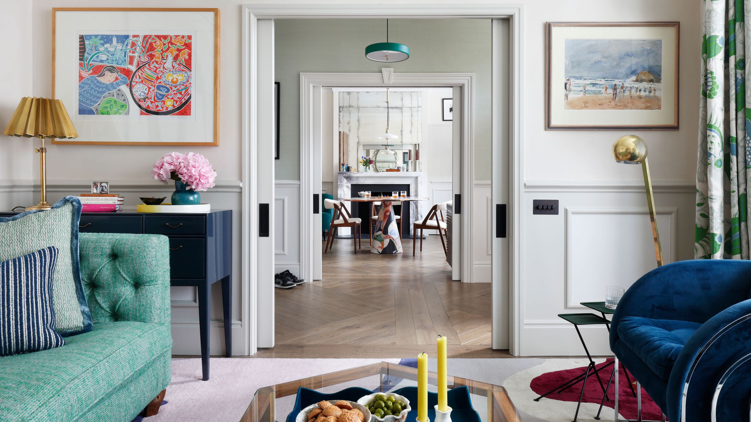 Image may contain: Architecture, Building, Furniture, Indoors, Living Room, Room, Dining Room, Dining Table, Table, and Lamp