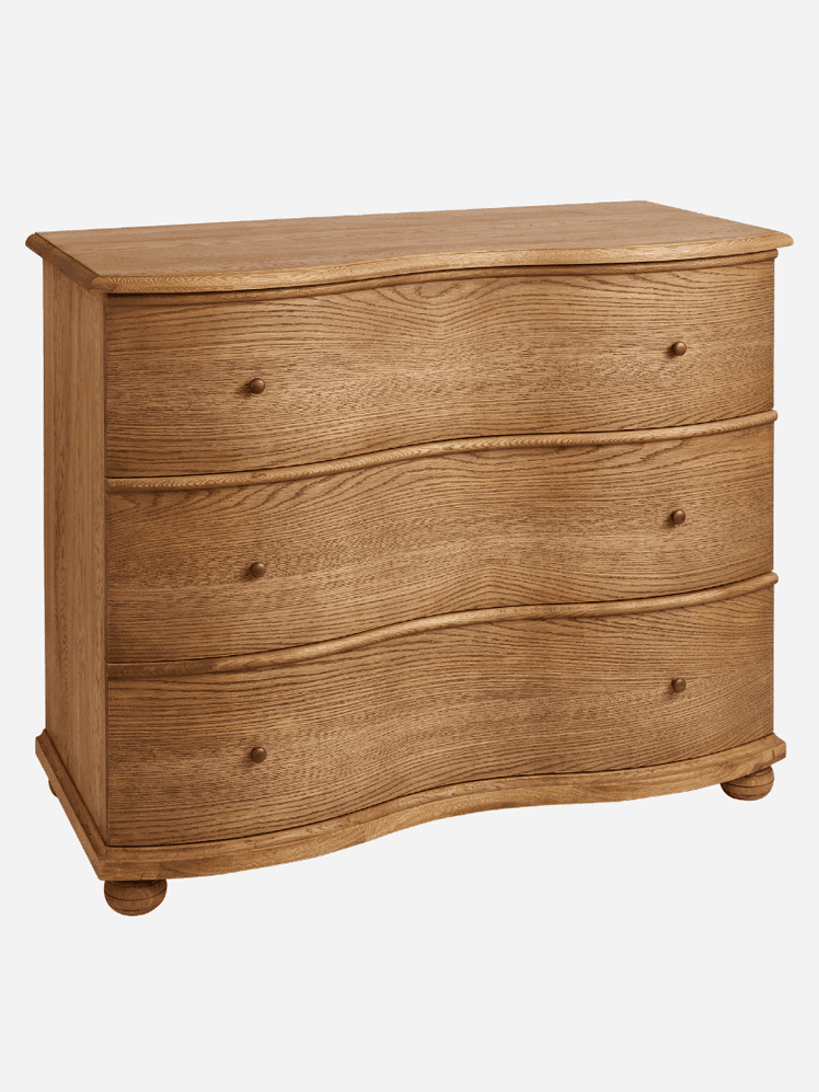 Image may contain Drawer Furniture Cabinet Dresser Crib and Infant Bed