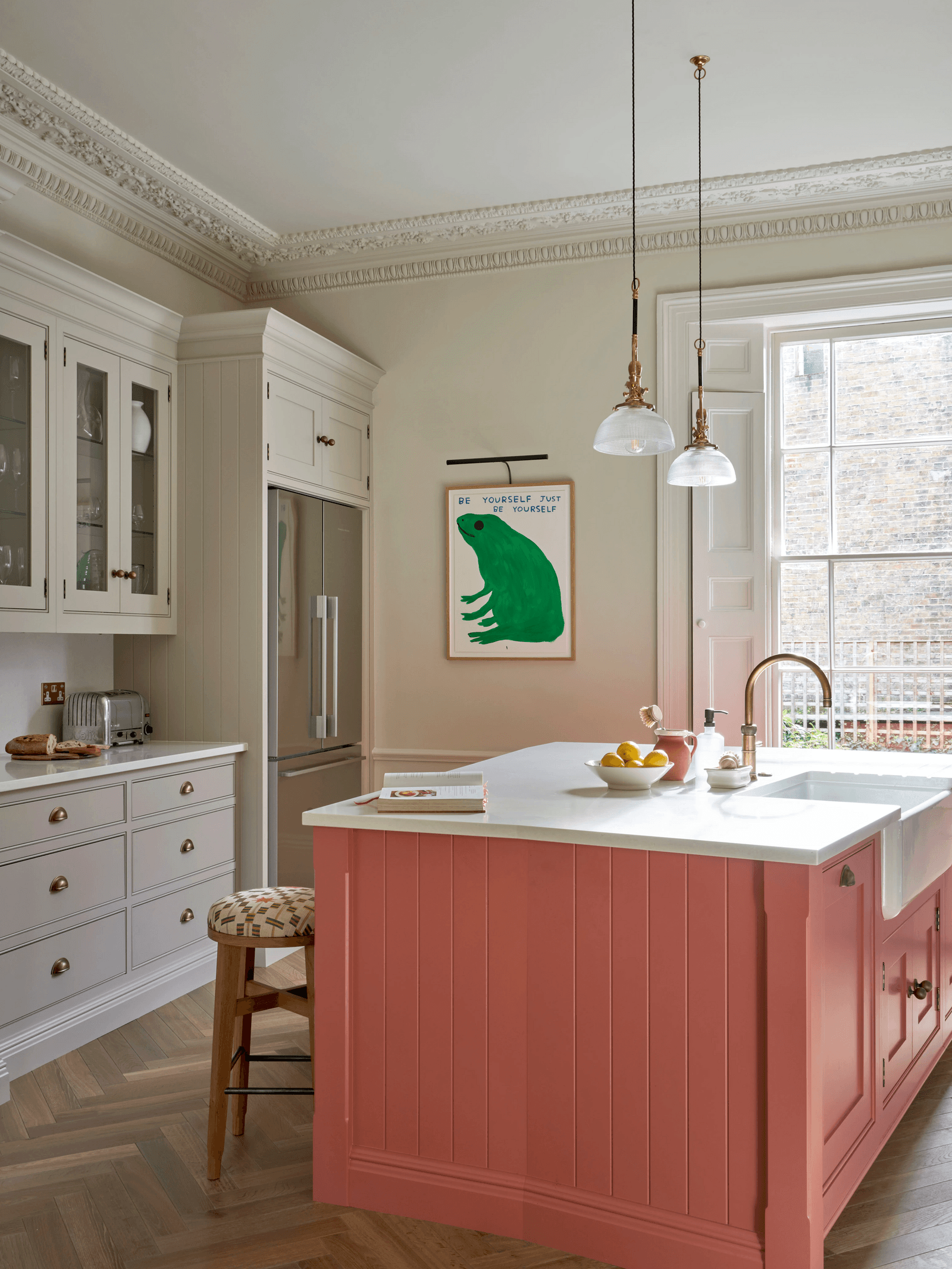 Image may contain Indoors Interior Design Sink Sink Faucet Kitchen Cabinet Furniture and Kitchen Island