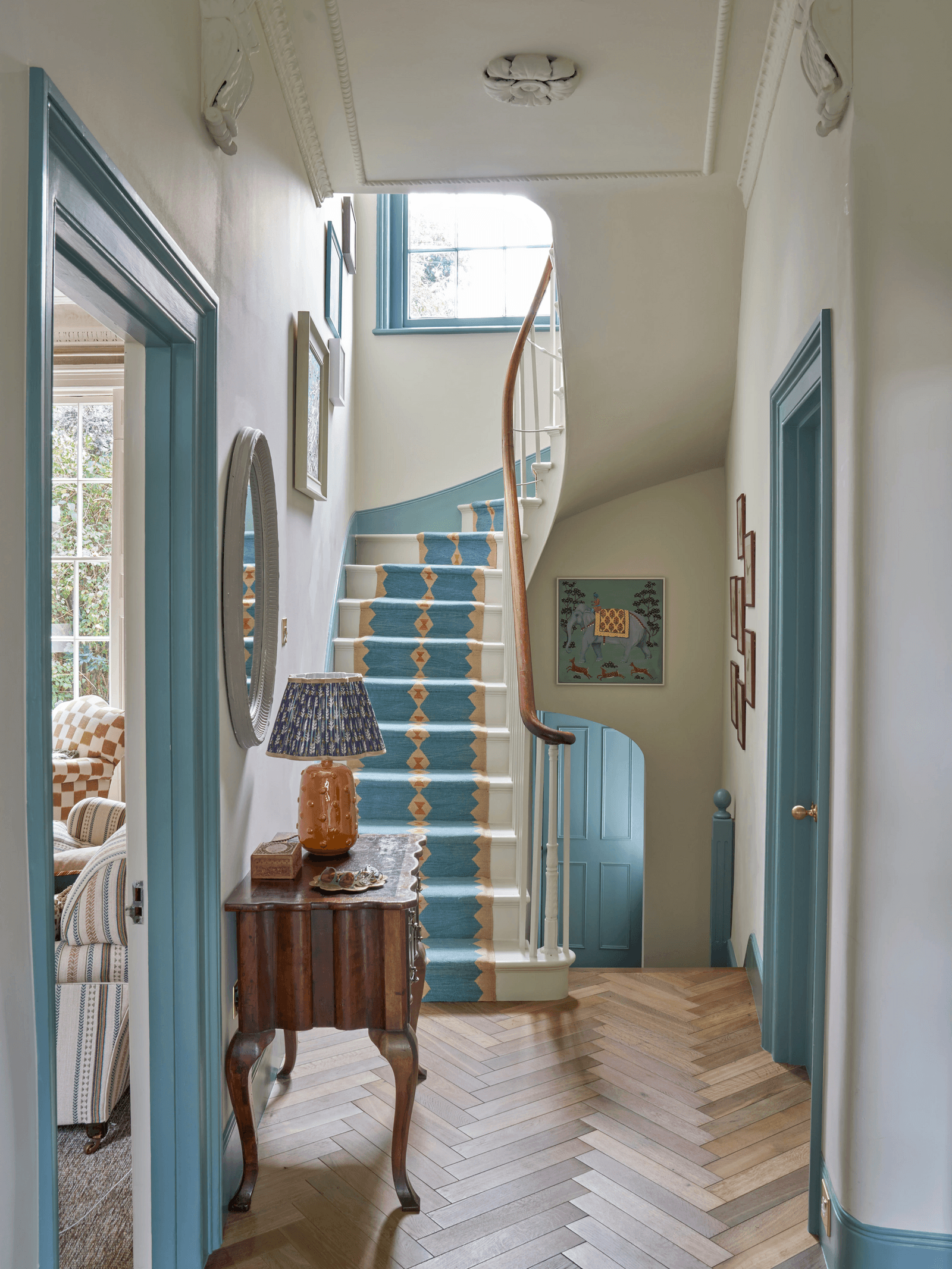 Image may contain Architecture Building Foyer Indoors Furniture Living Room Room Interior Design House and Housing