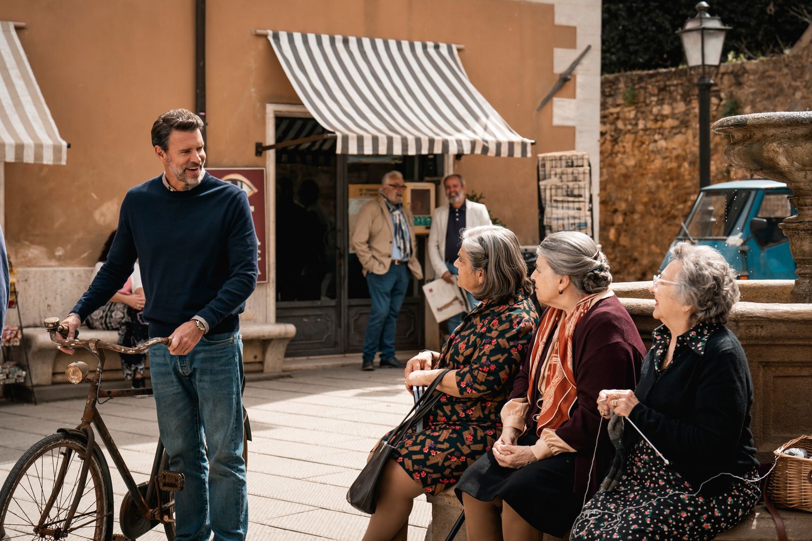 Image may contain Rose Friedman Scott Foley Adult Person Accessories Bag Handbag Wristwatch and Bicycle