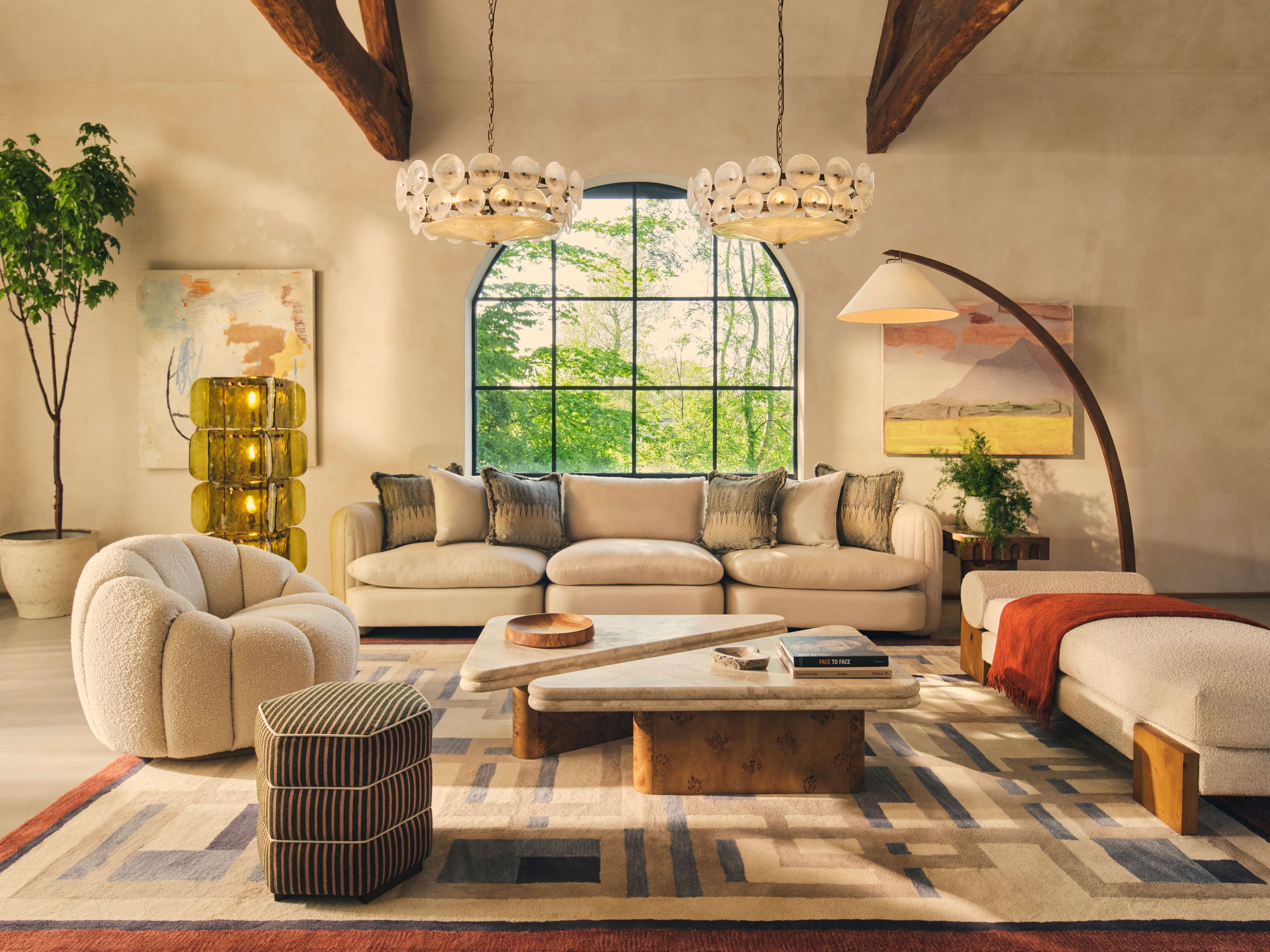 Image may contain: Home Decor, Lamp, Plant, Couch, Furniture, Rug, Architecture, Building, Indoors, Living Room, and Room