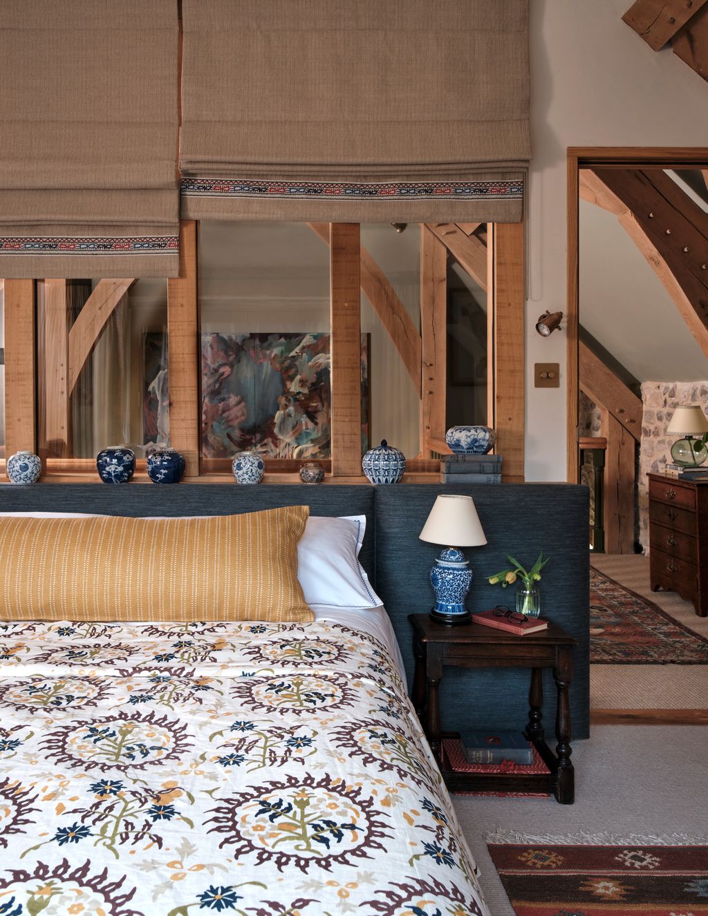 Image may contain Lamp Indoors Interior Design Book Publication Plant Home Decor Rug Cushion Bed and Furniture