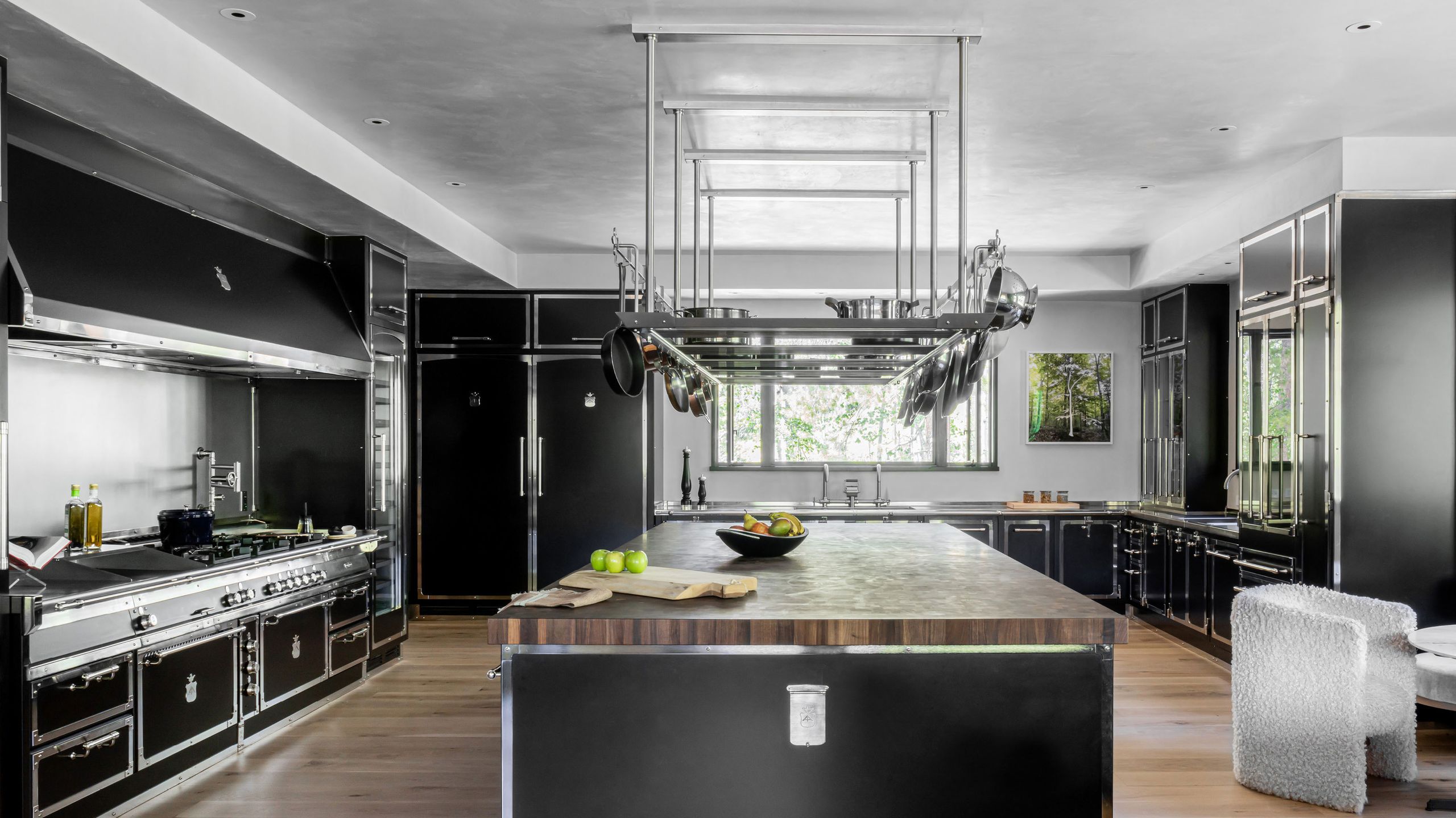 Image may contain: Indoors, Interior Design, Kitchen, Kitchen Island, Appliance, Device, Electrical Device, and Refrigerator