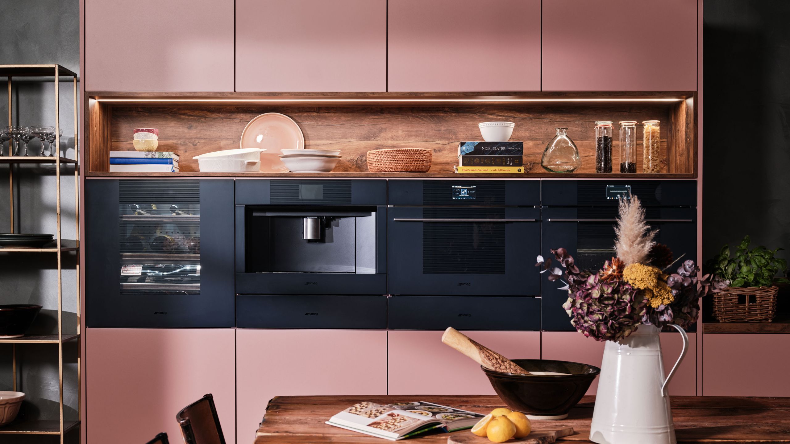 Image may contain: Indoors, Interior Design, Kitchen, Chair, Furniture, Plant, Table, Tabletop, Appliance, and Device