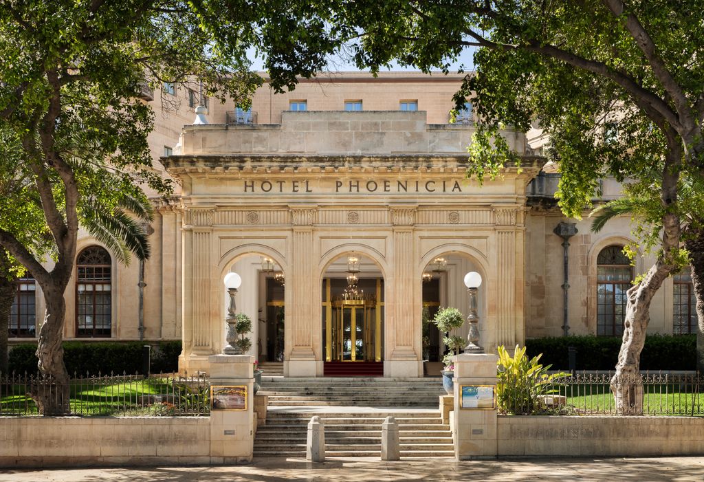 Image may contain Plant Architecture Building House Housing Villa Portico and Tree