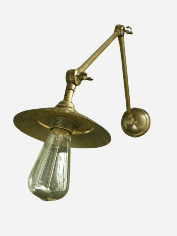 Image may contain: Bronze, Bathroom, Indoors, Room, Shower Faucet, Light Fixture, and Lamp