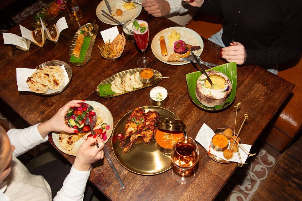 Image may contain Brunch Food Dining Table Furniture Table Meal Dish Plate Adult Person and Wedding