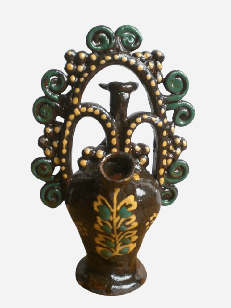 Image may contain: Jar, Pottery, Vase, Art, Handicraft, and Urn