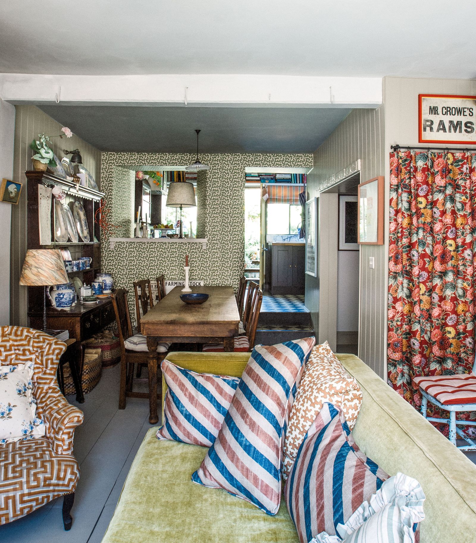 Image may contain Home Decor Cushion Lamp Couch Furniture Art Painting Architecture Building and Indoors