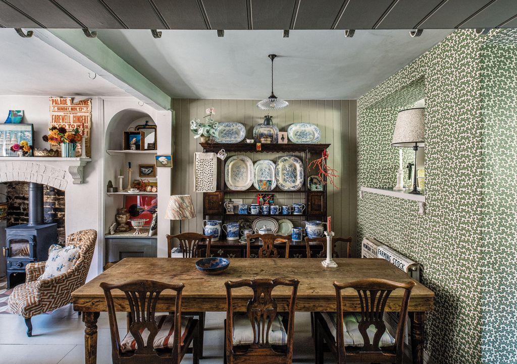 Image may contain Architecture Building Dining Room Dining Table Furniture Indoors Room Table Home Decor and Chair