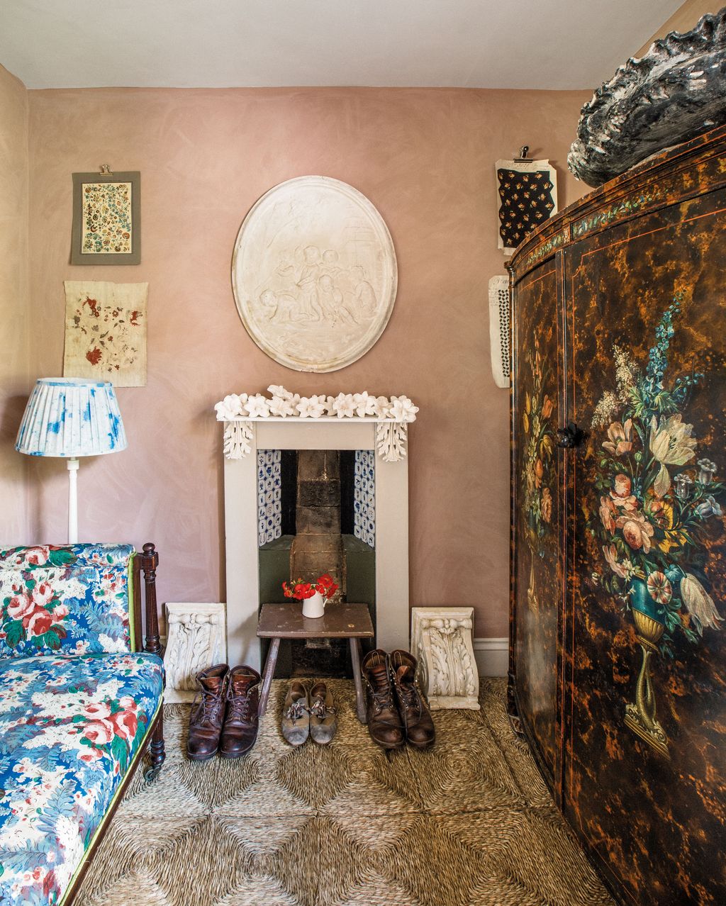 Image may contain Home Decor Lamp Clothing Footwear Shoe Rug Corner Indoors Cushion Art and Painting